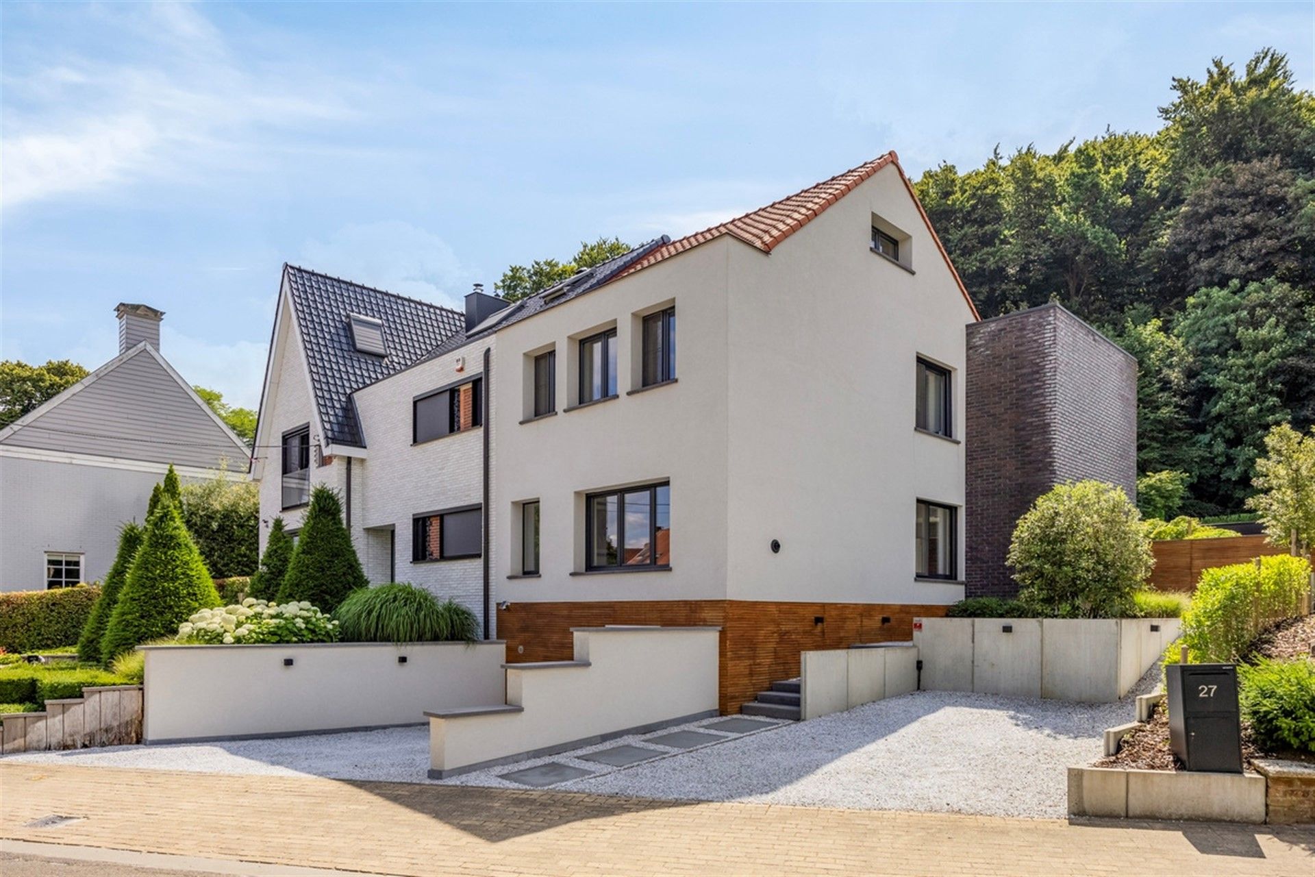 Instapklare gezinswoning met prachtig boszicht in Kortenberg. foto {{pictureIndex}}