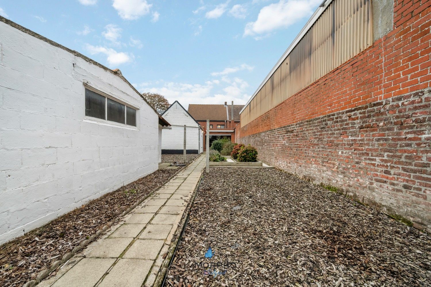 Te renoveren gezinswoning met karakter en potentieel in hartje Ruddervoorde foto 23