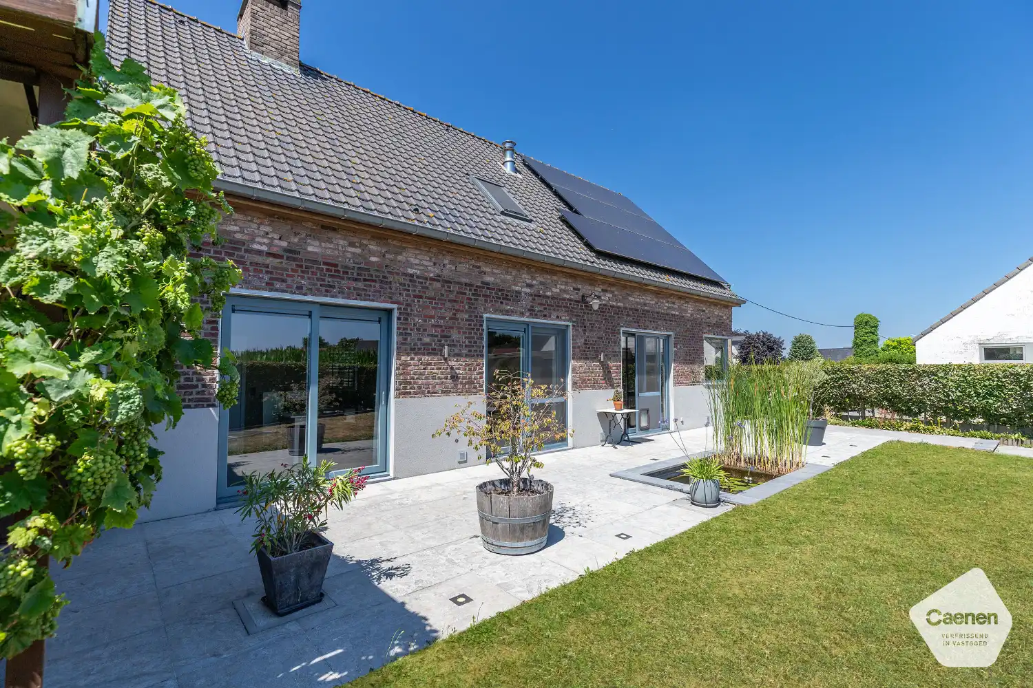 Stijlvol en energiezuinig huis met 3 slaapkamers en mooie tuin met uitzichten in Ruddervoorde foto 3