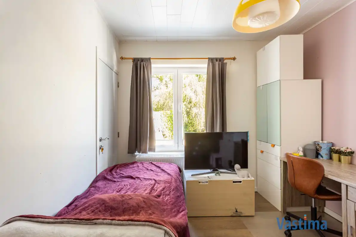 Energiezuinige en instapklare starterswoning met 2 slaapkamers in hartje Erembodegem foto 15