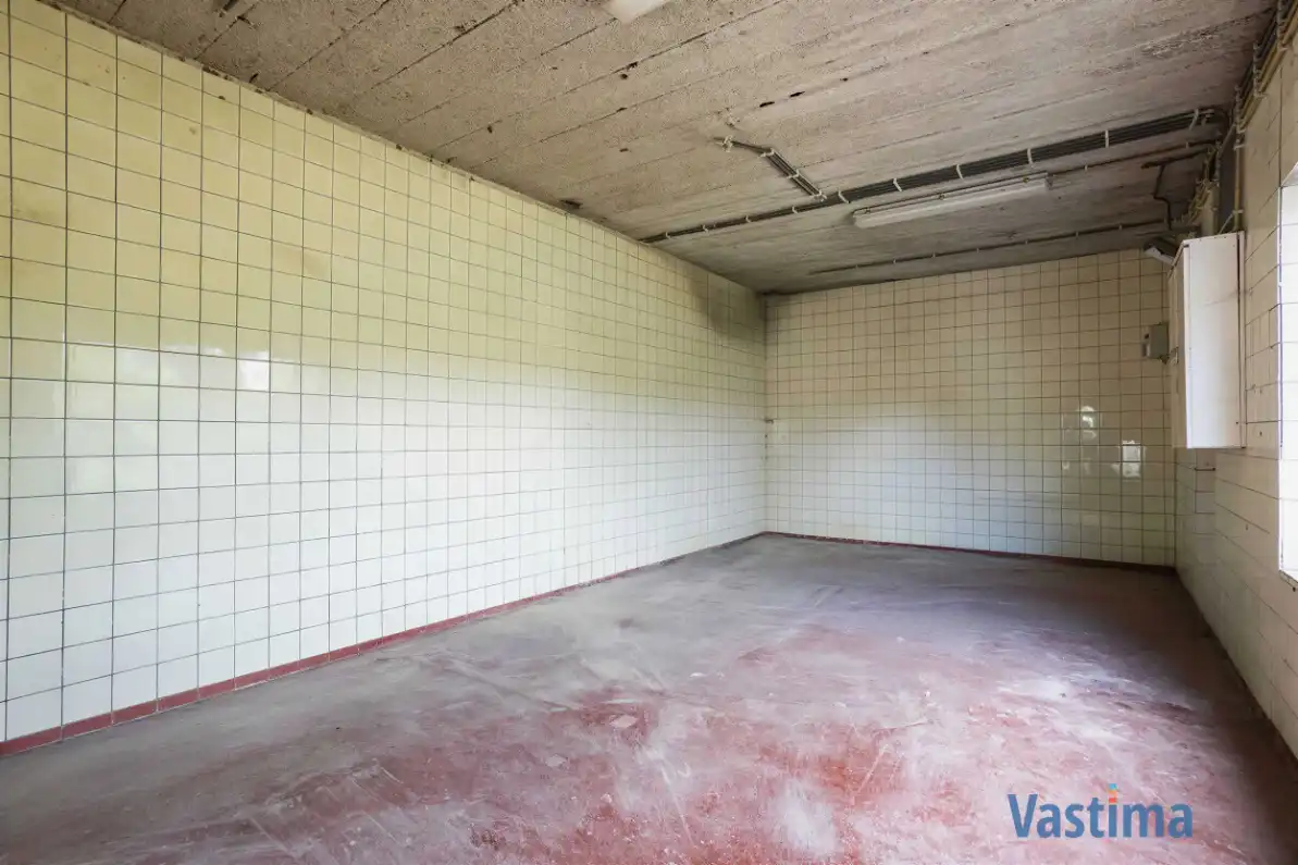 Woning met opslagruimte en grond op strategische ligging foto 24