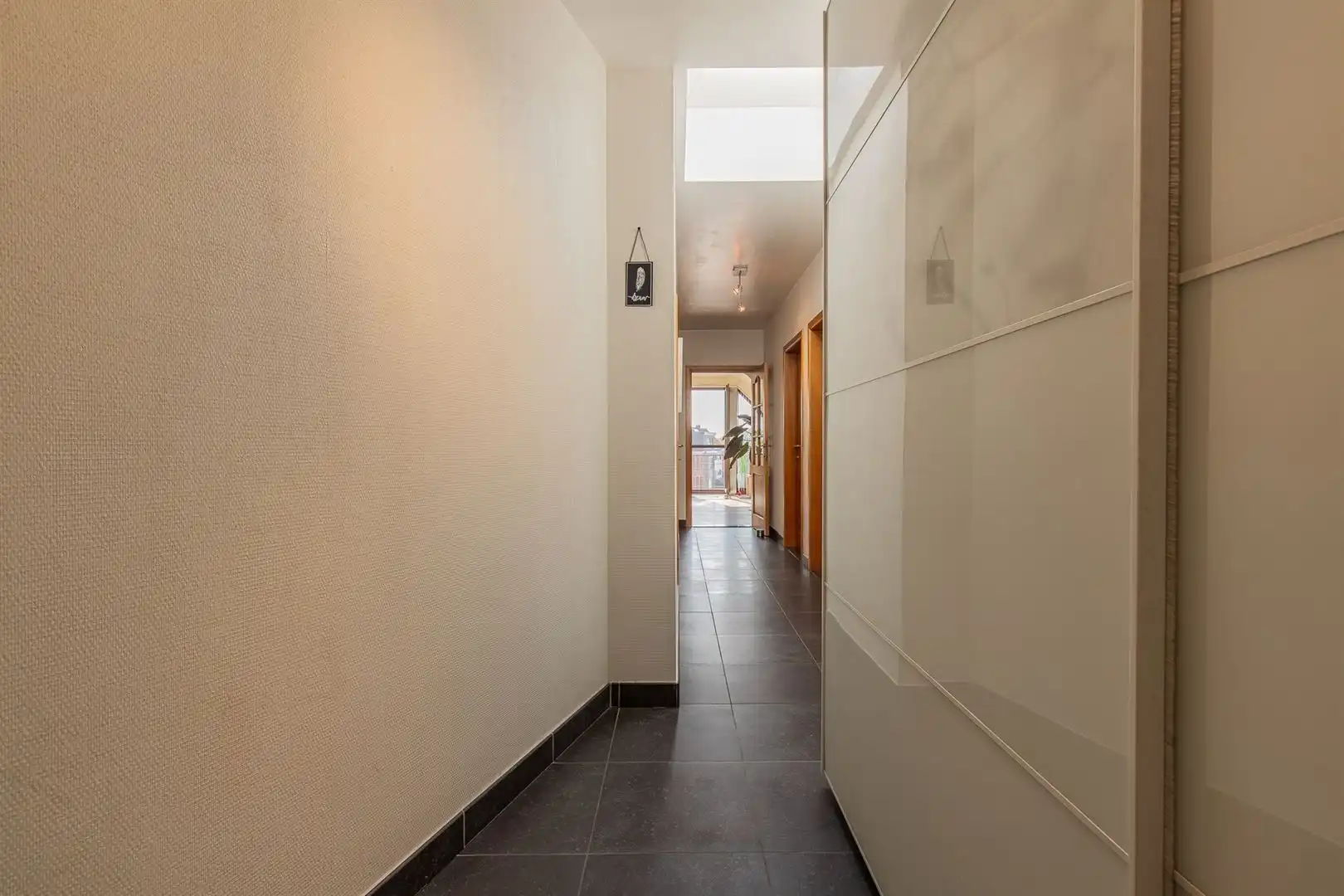 Instapklaar dakappartement met terras en EPC-label A in Beveren foto 18