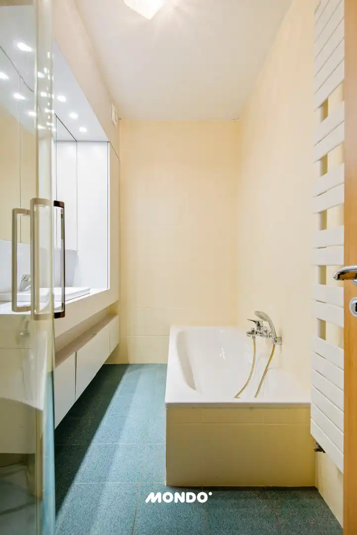 Gelijkvloers appartement met staanplaats en kelderberging! foto 10