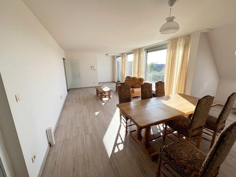 Ruim en luxueus appartement met 2,5 slaapkamers, 3 terrassen en 2 parkings in hartje Diepenbeek! foto 5
