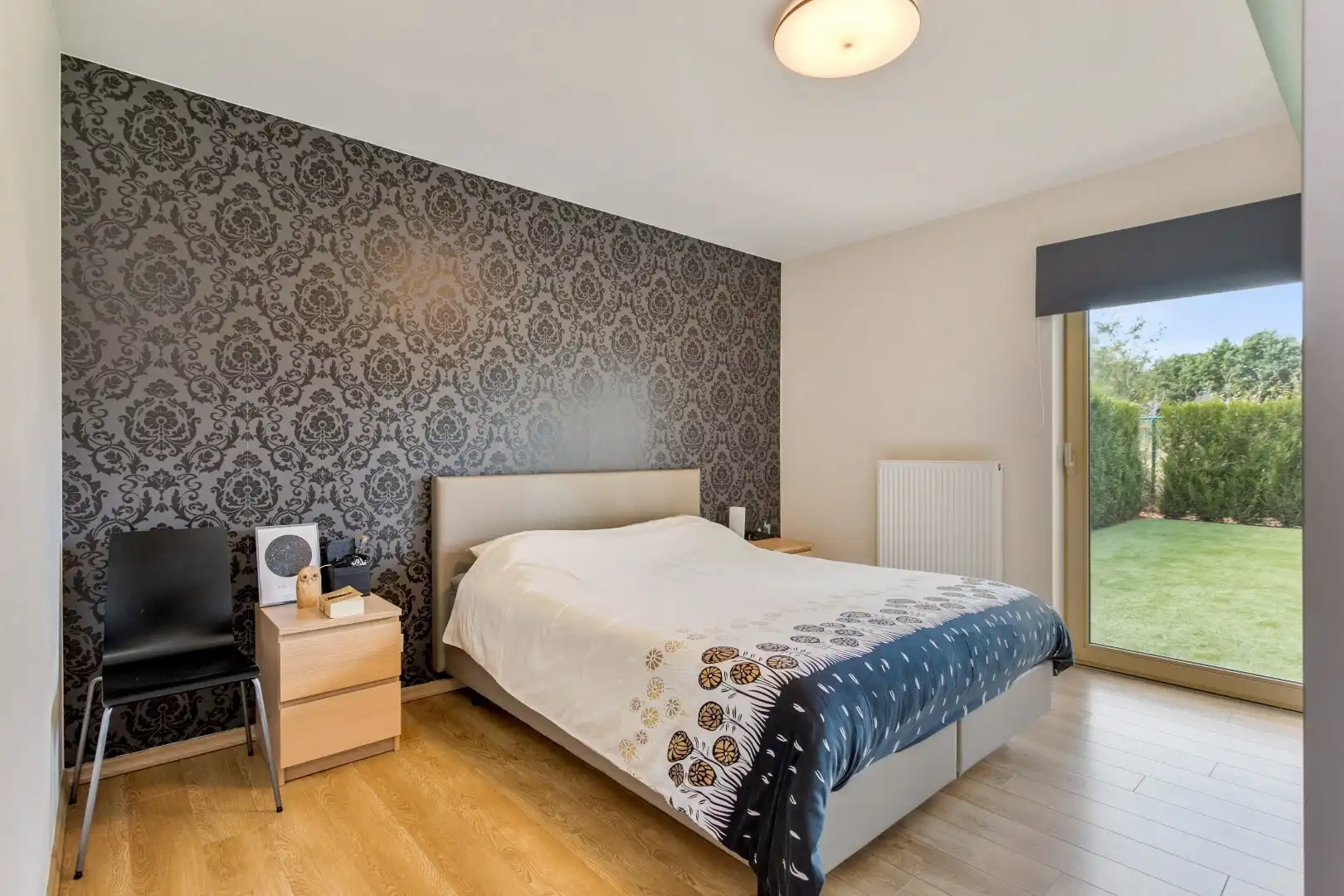 Modern, gelijkvloers appartement met 2 slpk, ondergrondse parking en tuin. foto 10
