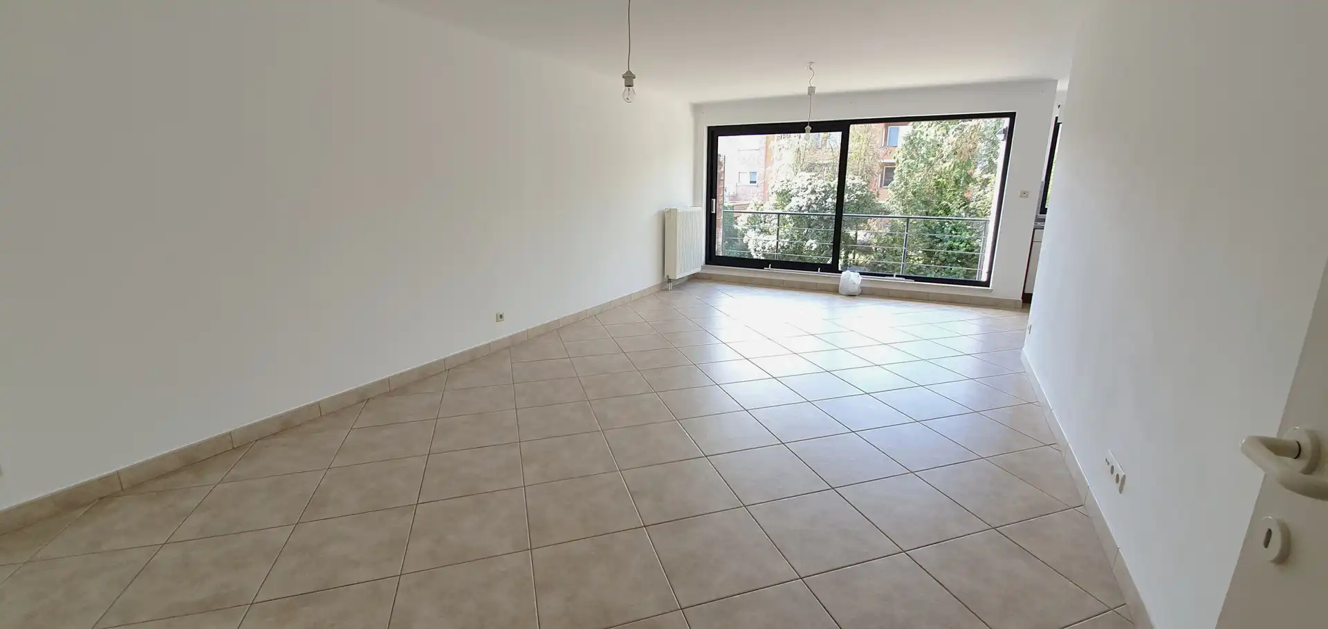 Rustig gelegen appartement met terras, garagebox en lift foto 2