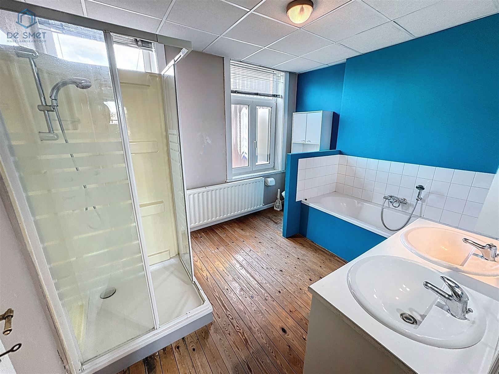 Instapklaar herenhuis met 3 slaapkamers, garage en royaal terras in het hart van Meerbeke foto 23