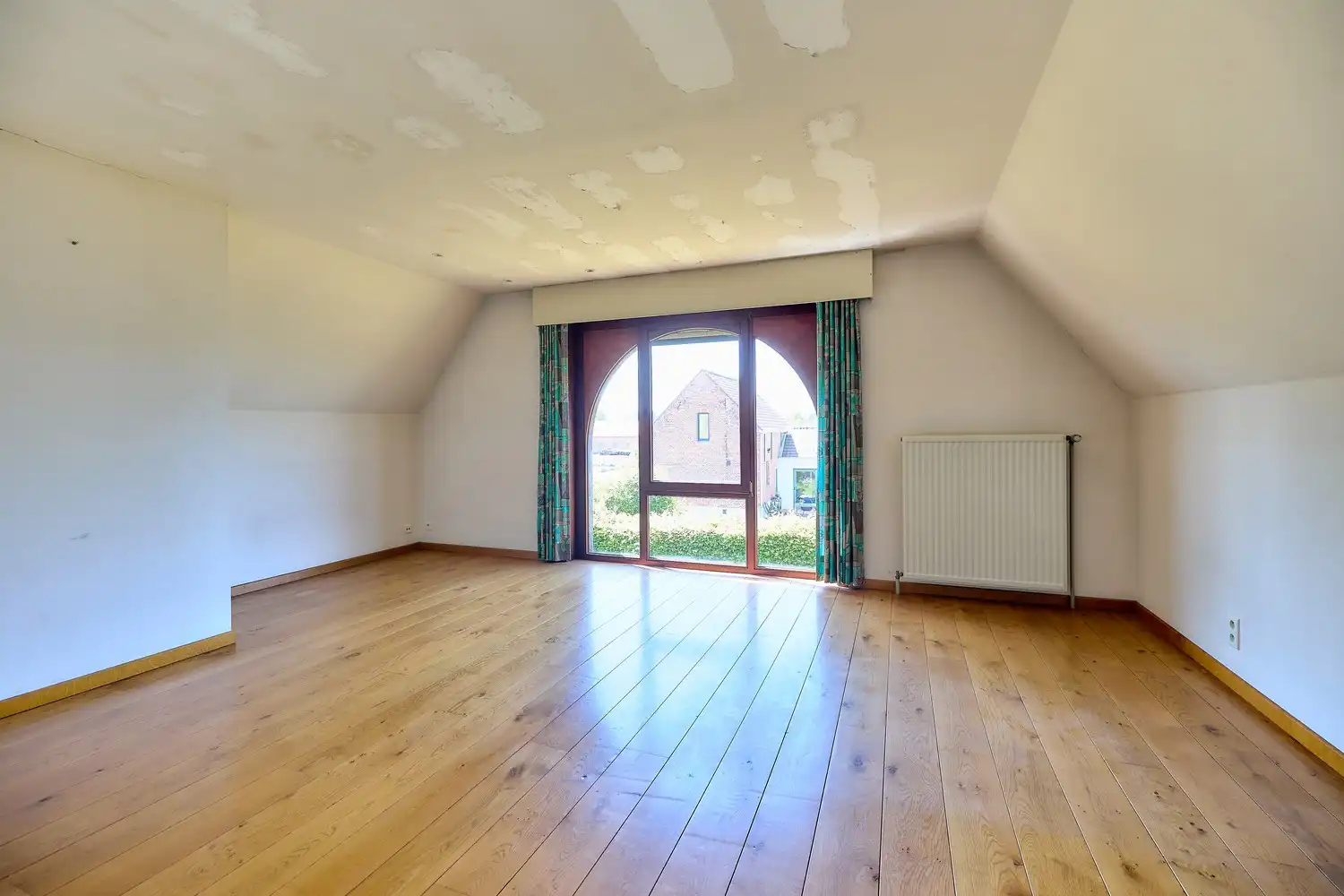 Ruime en degelijk gebouwde villa op groen perceel van 1318m² met zicht op de velden foto 15