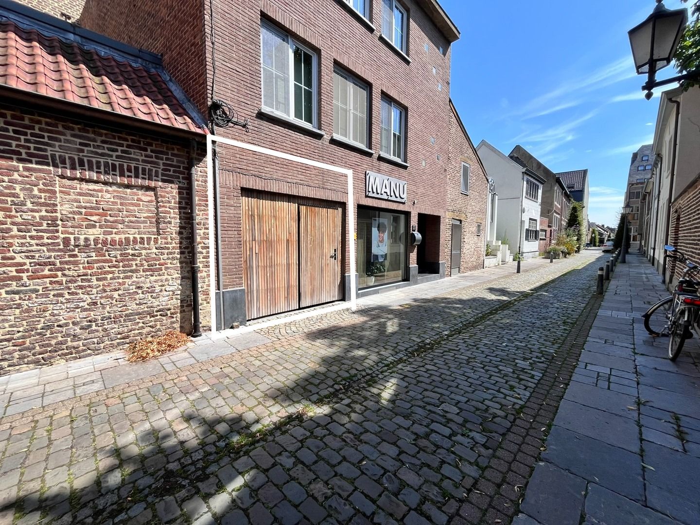 Opbrengsteigendom bestaande uit een gelijkvloers handelspand en 3 appartementen foto 3