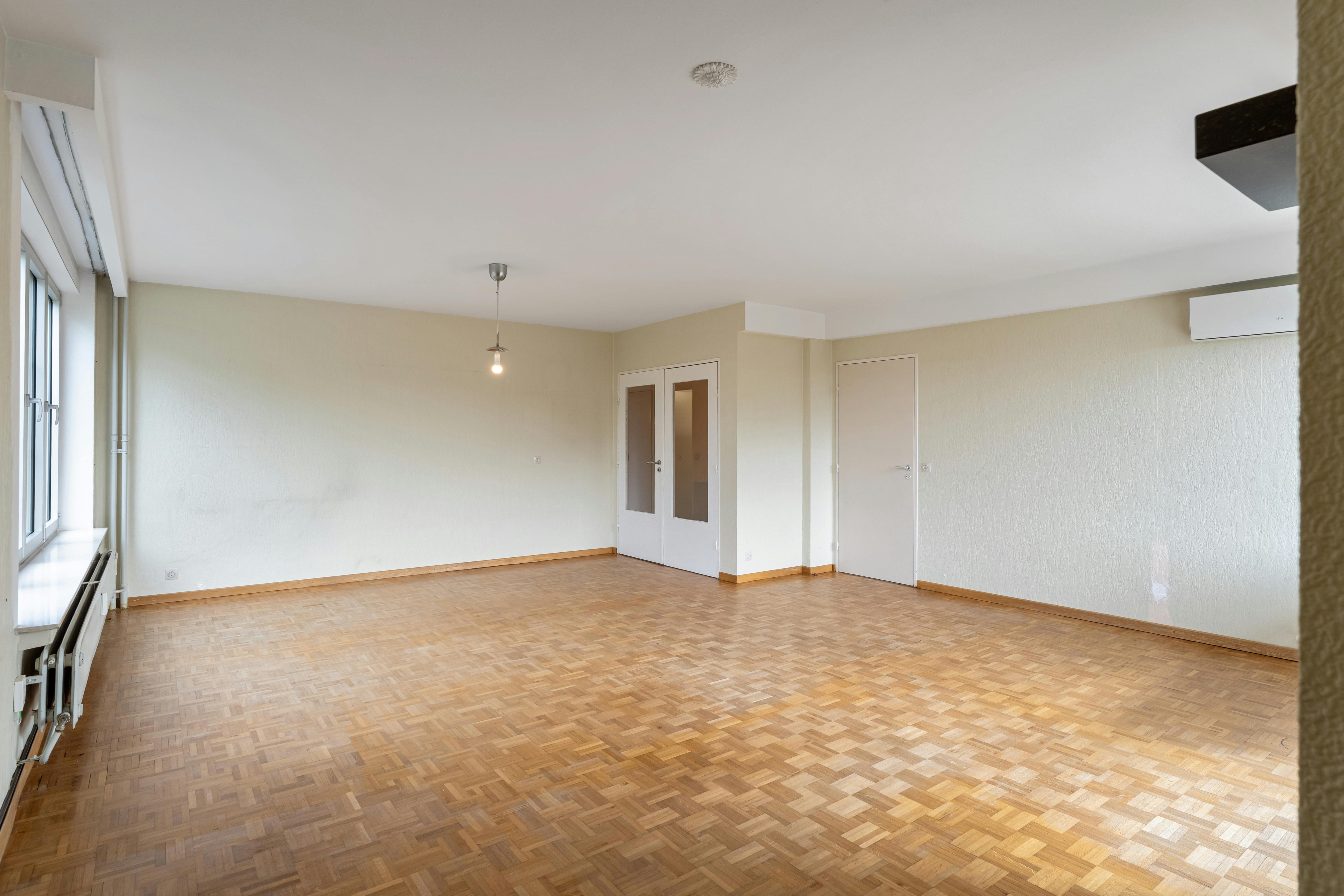 Ruim 3-slaapkamerappartement met terras en garagebox in hartje Genk foto 6