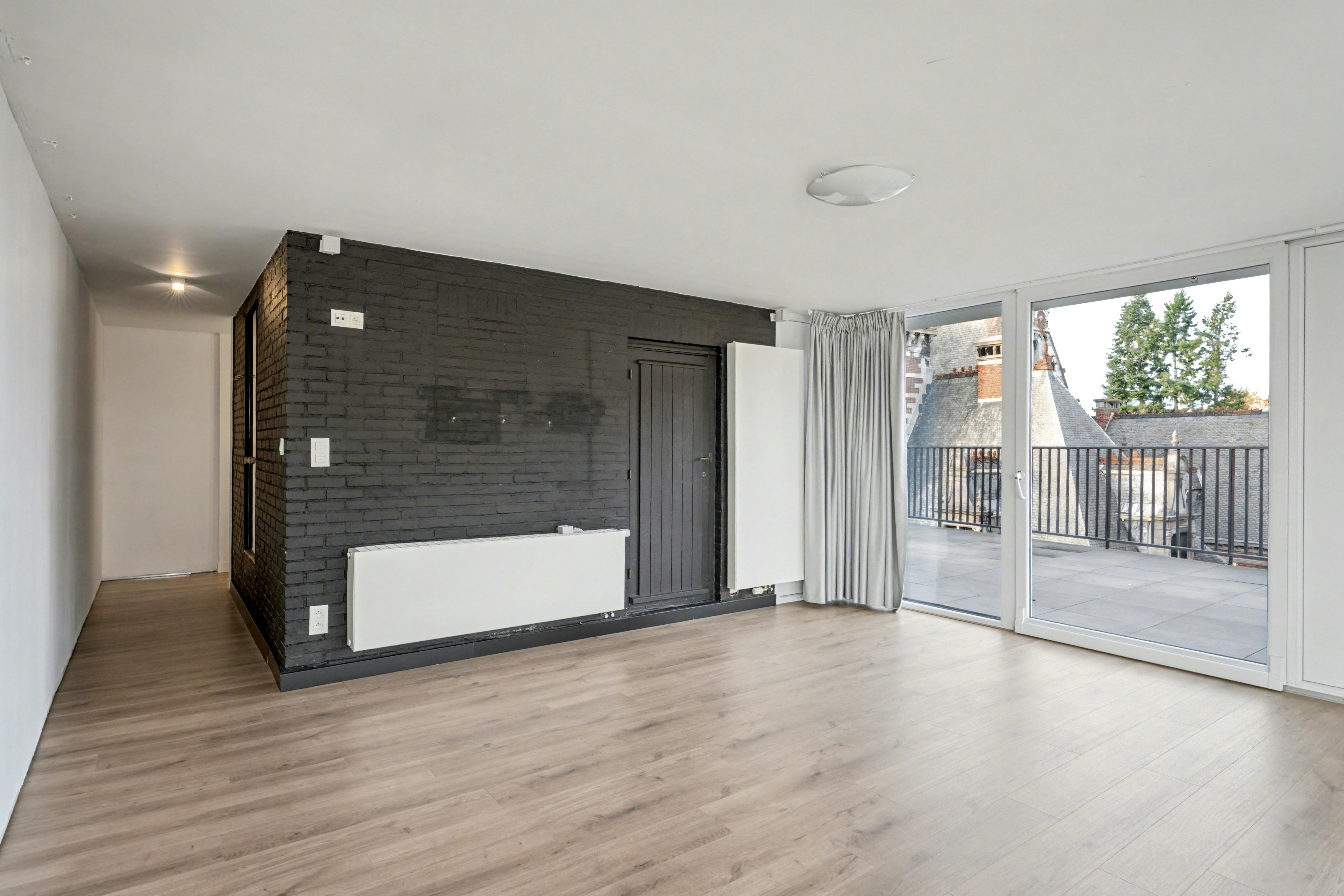 Exclusief duplex-penthouse met adembenemend terras in hartje Hasselt foto 12