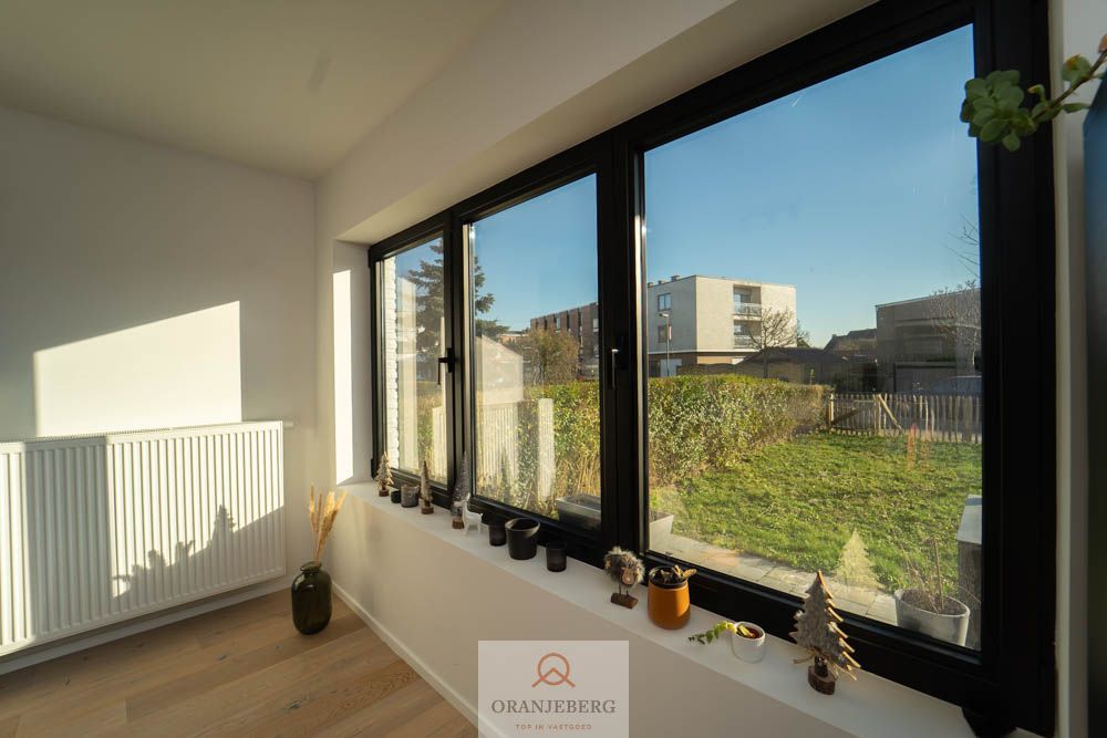 Gerenoveerd zonnig gelijkvloers 2-slaapkamerappartement met tuin foto 14