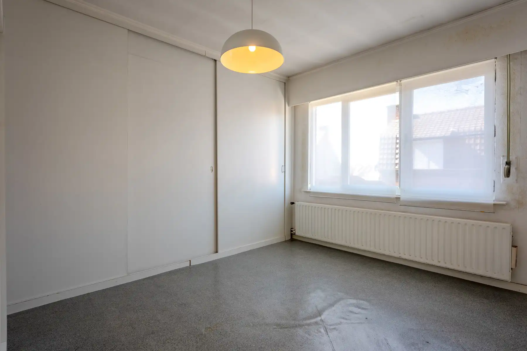 Te renoveren woning in het centrum met garage en terras! foto 6