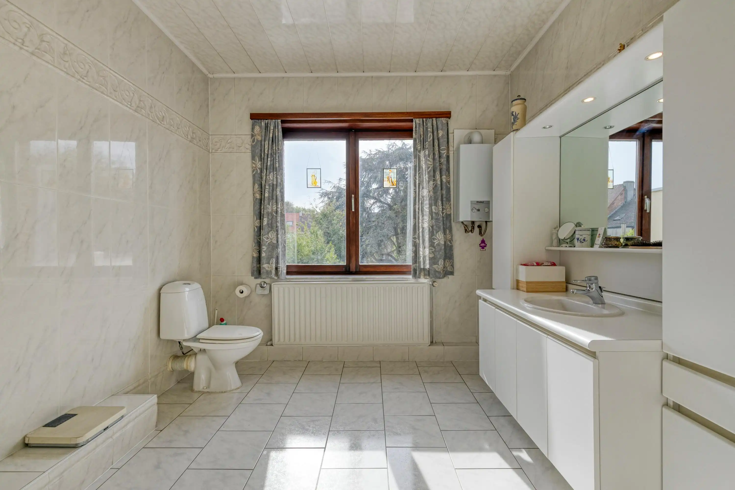 Huis te koop met veel mogelijkheden en tuin te Gentbrugge  foto 14