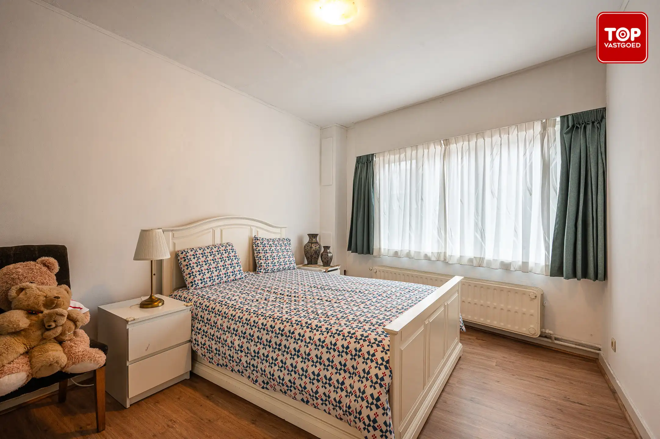 Instapklare woning met 4 slaapkamers en tuin in het hart van Sleidinge foto 24