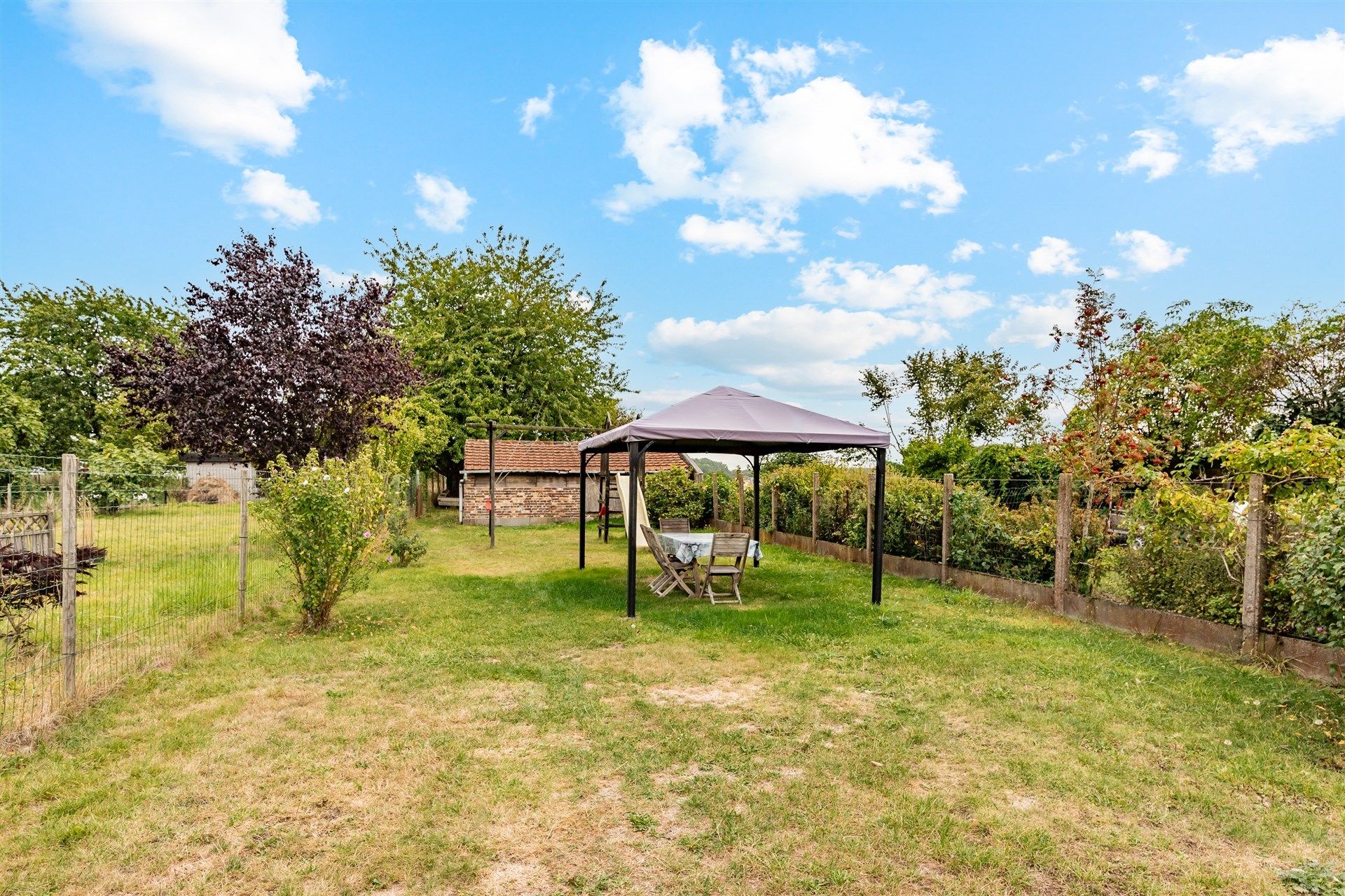 Gezinswoning met vier slaapkamers, garagegebouw en grote tuin op 1705 m² foto 18