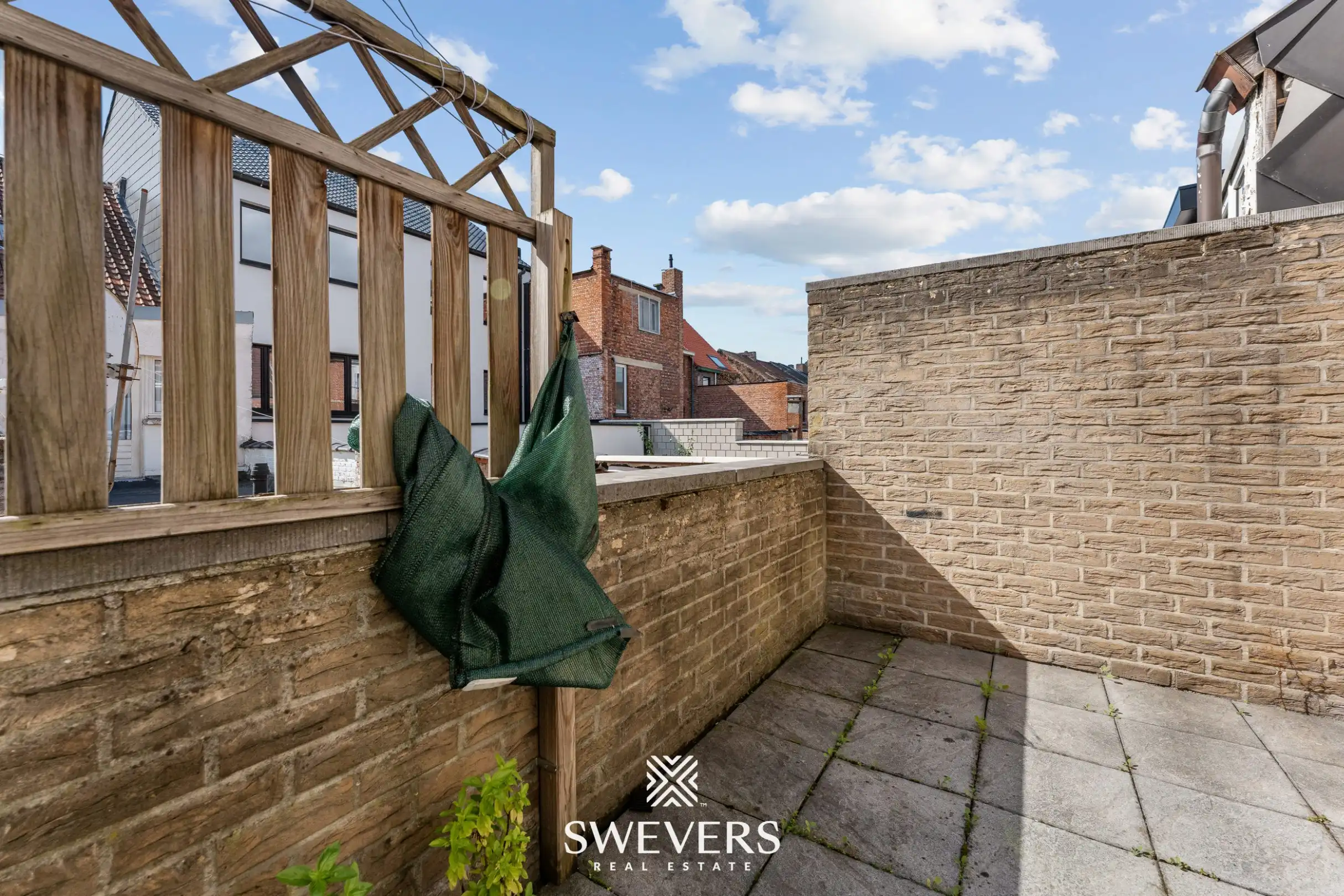 Gerenoveerd 2-slaapkamerappartement met ZW-terras vlak bij Hasselt centrum foto 24