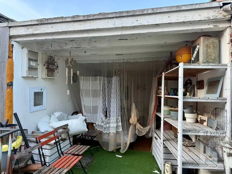 2 Appartementen + 4 winkels foto 12