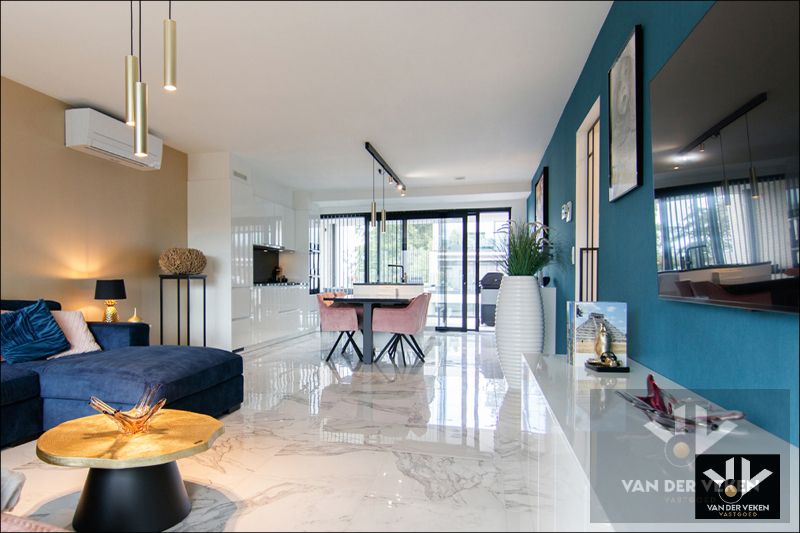 Hoogwaardig afgewerkt, rustig en centraal gelegen nieuwbouwappartement met 2 terrassen en garage in het gezellige Kortessem foto 5
