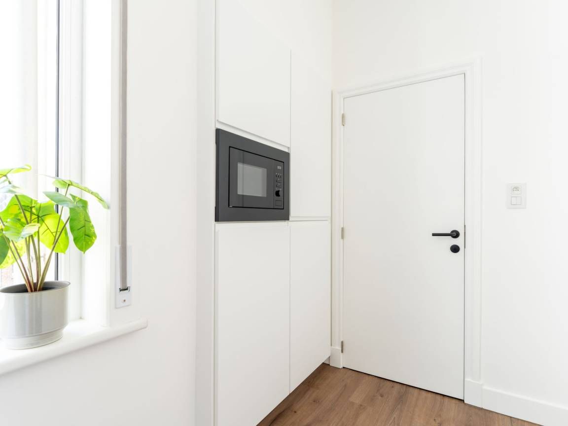 Instapklaar één slaapkamer appartement vlakbij het strand foto 13