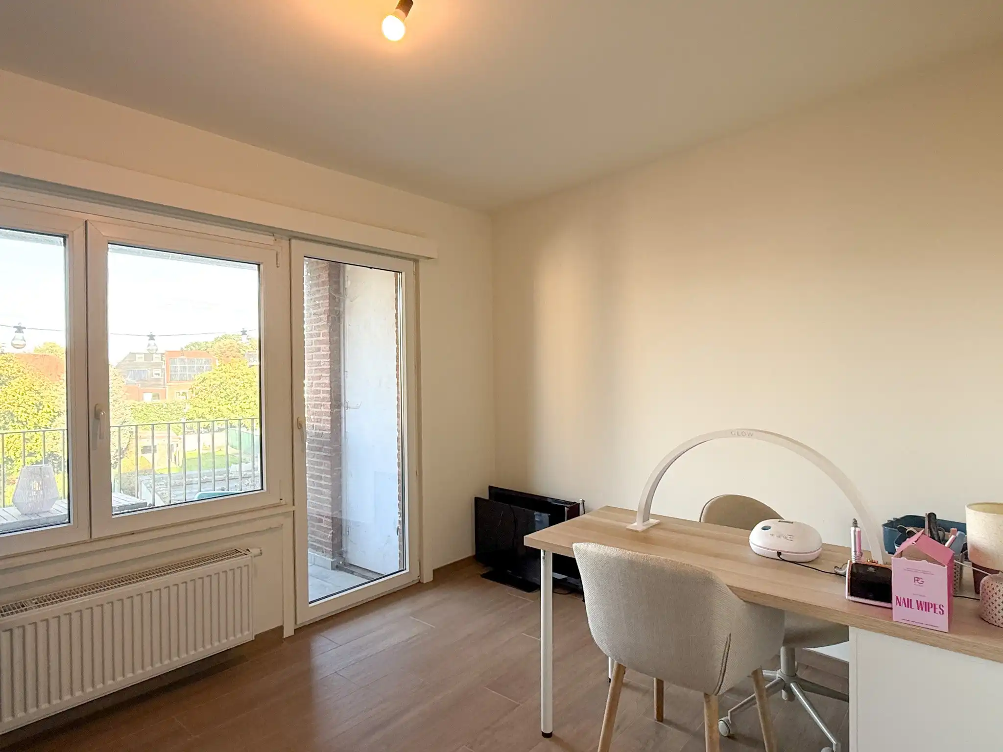 Centraal gelegen appartement met twee slaapkamers, terras en autostaanplaats foto 11