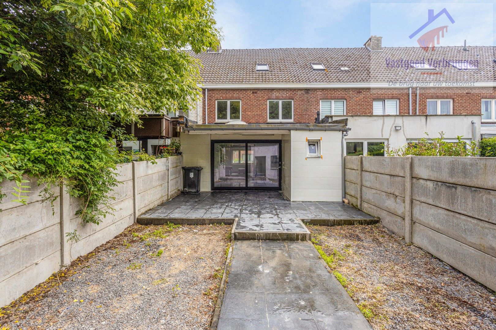 Centraal gelegen ruime woning met 5 slaapkamers, 2 badkamers en tuin! foto 16