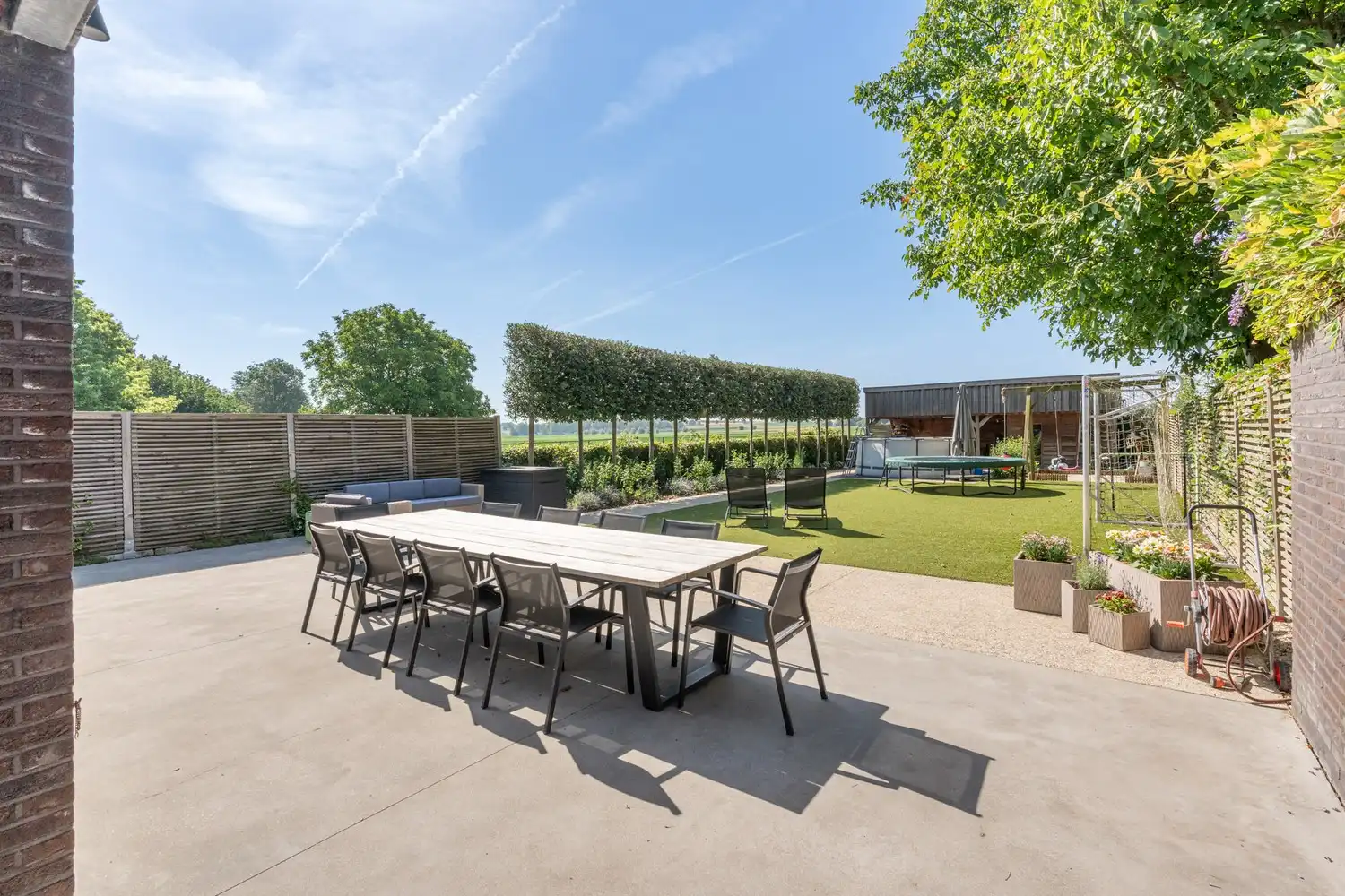 Instapklare en energiezuinige halfopen bebouwing met zuidgerichte tuin en vrij uitzicht op het groen! foto 10
