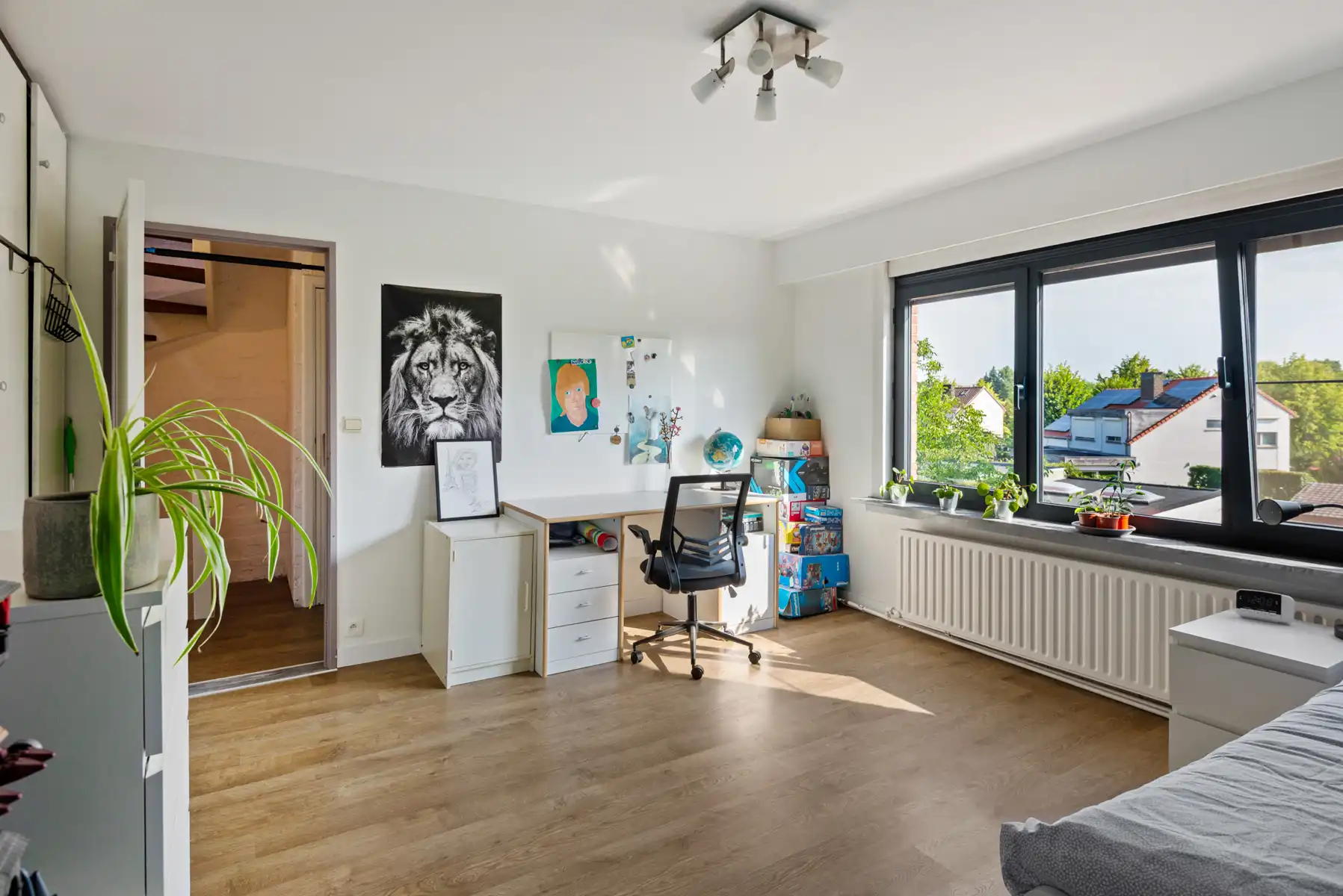 Ruime instapklare beletagewoning met bijna 250 m² bewoonbare oppervlakte, rustgevende tuin én dakterras foto 15