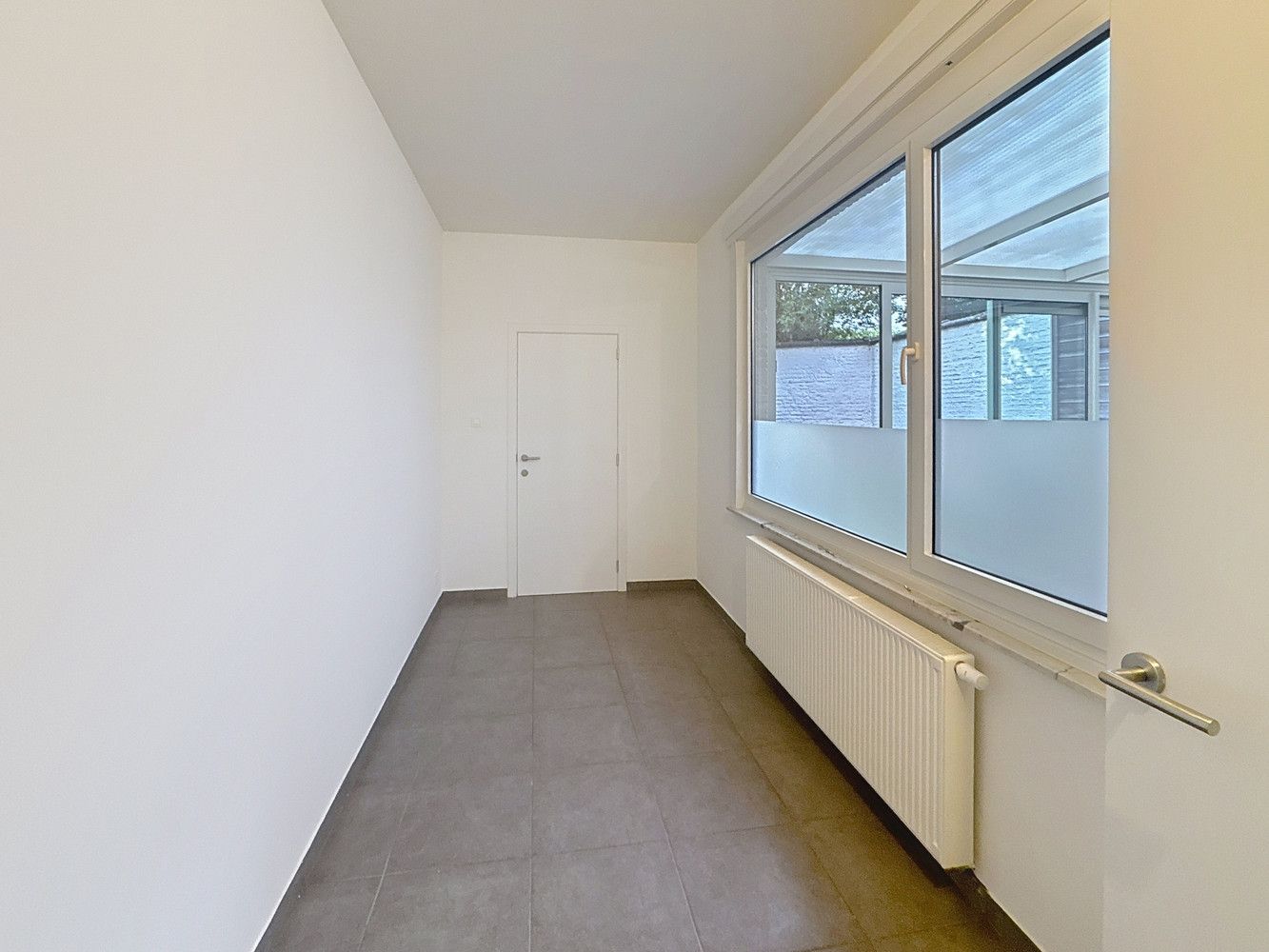Gelijkvloers appartement met stadstuin foto 12