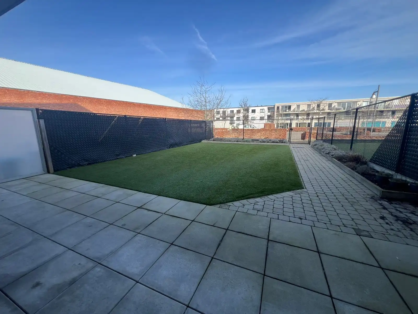 Ruim gelijkvloers appartement  met tuin op topligging. foto 15