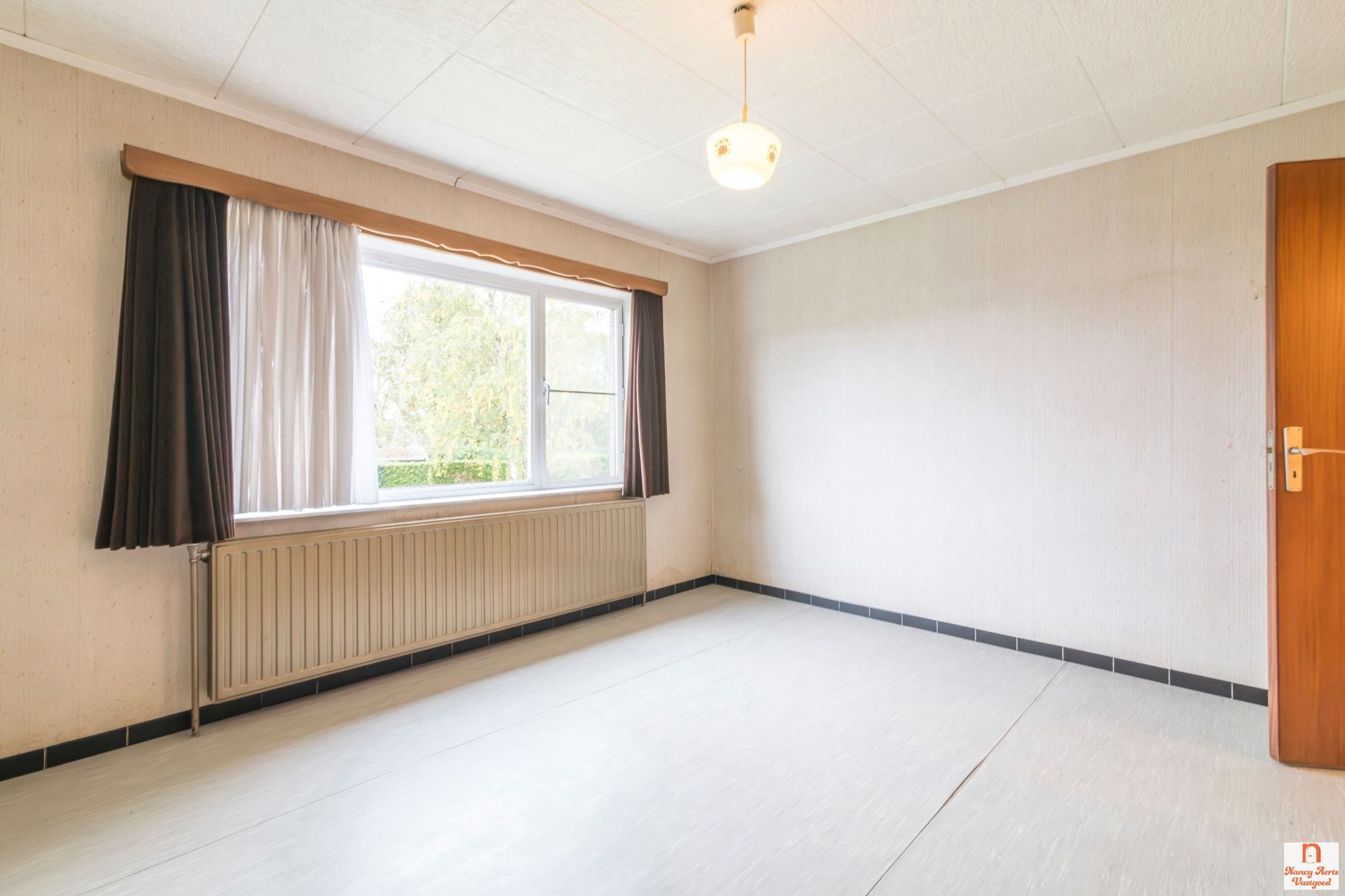 Split-level woning met grote tuin en vrij uitzicht foto 29