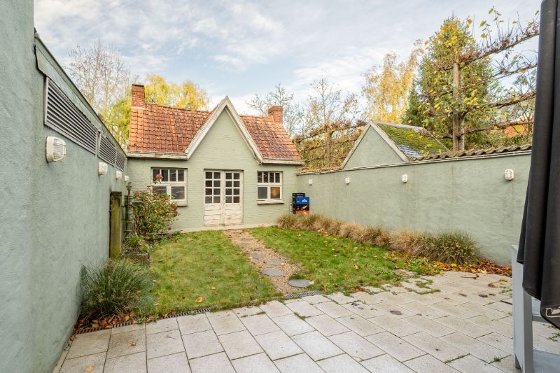 Commercieel handelspand met bovenliggende woonst op de Markt van Ingelmunster foto 23