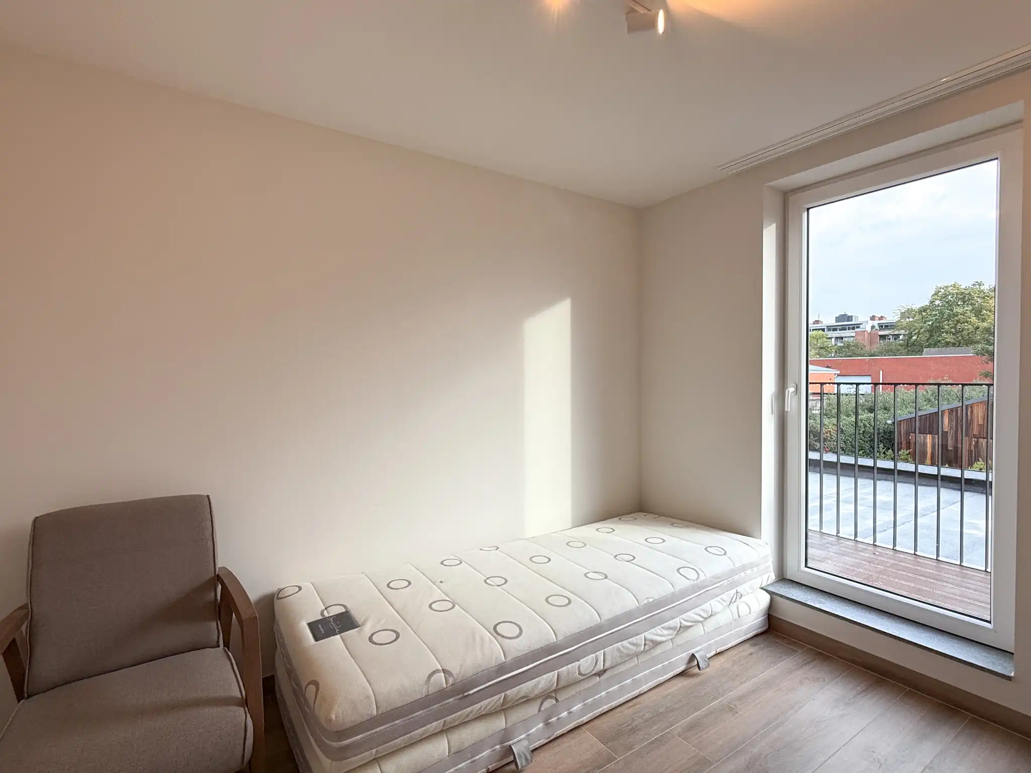 Energiezuinig appartement met twee slaapkamers en autostaanplaats dichtbij centrum Beveren foto 17