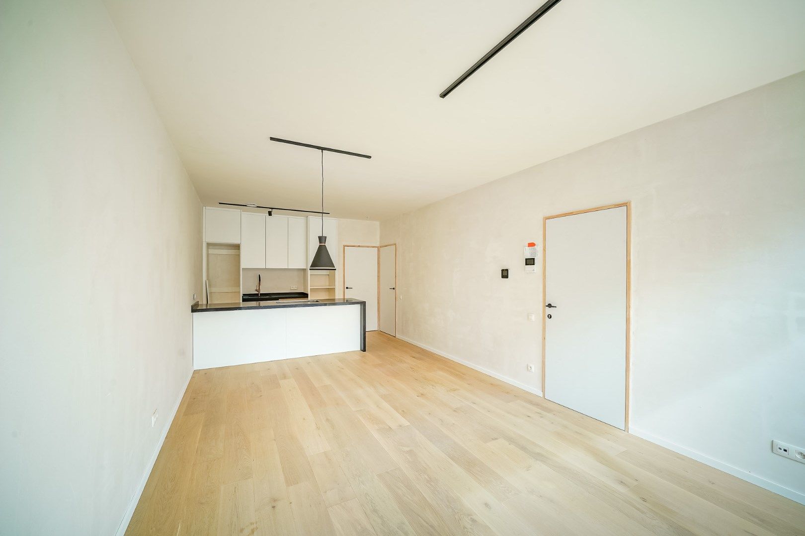 Nieuw 1-slaapkamerappartement met parking! foto 2