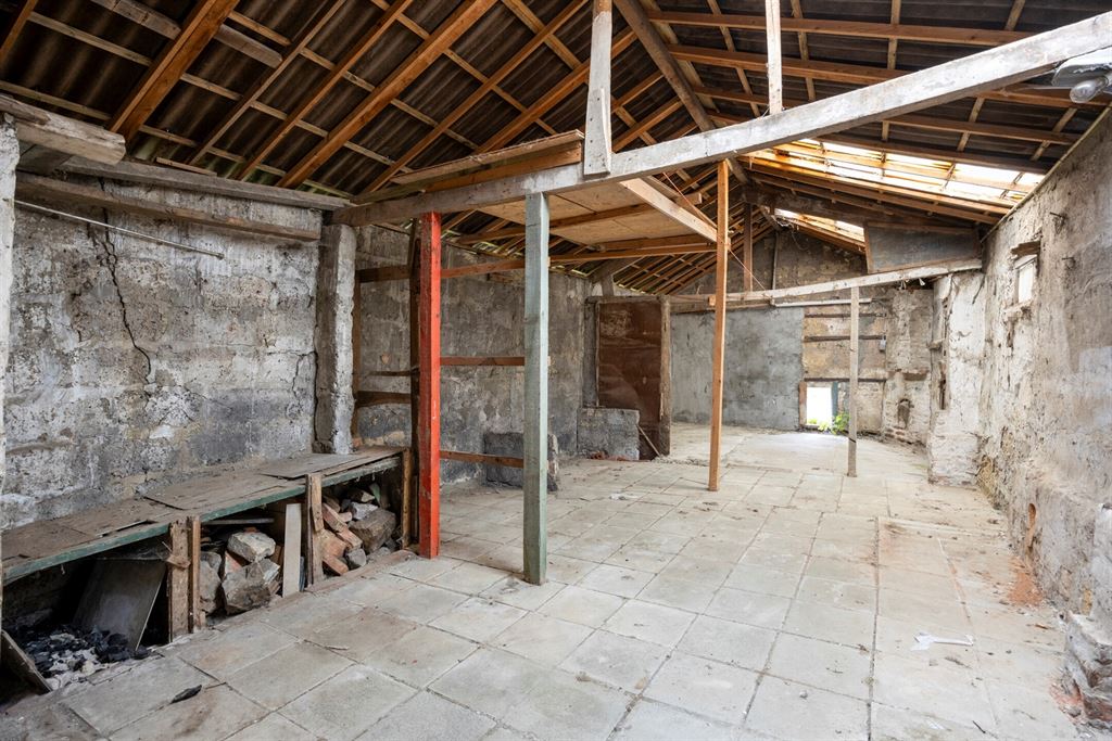 Halfopen woning met potentieel  foto 17