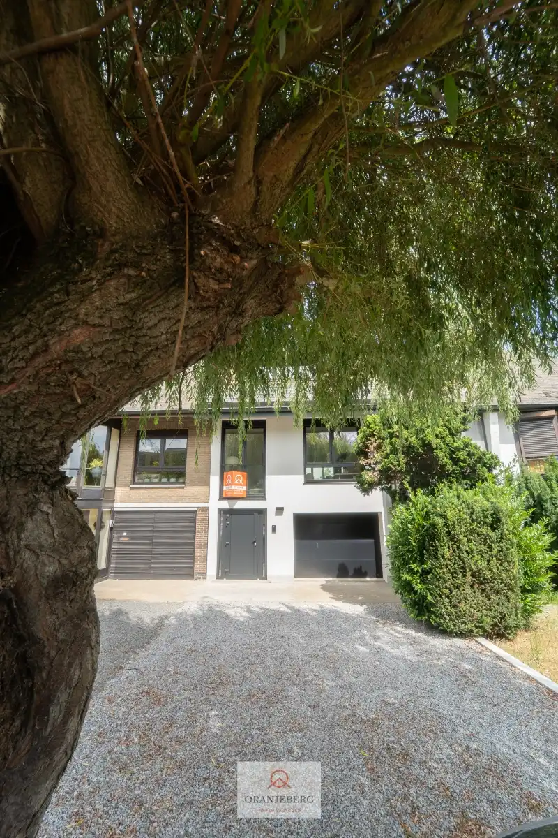 Uitmuntend gelegen gerenoveerde woning ! foto 38