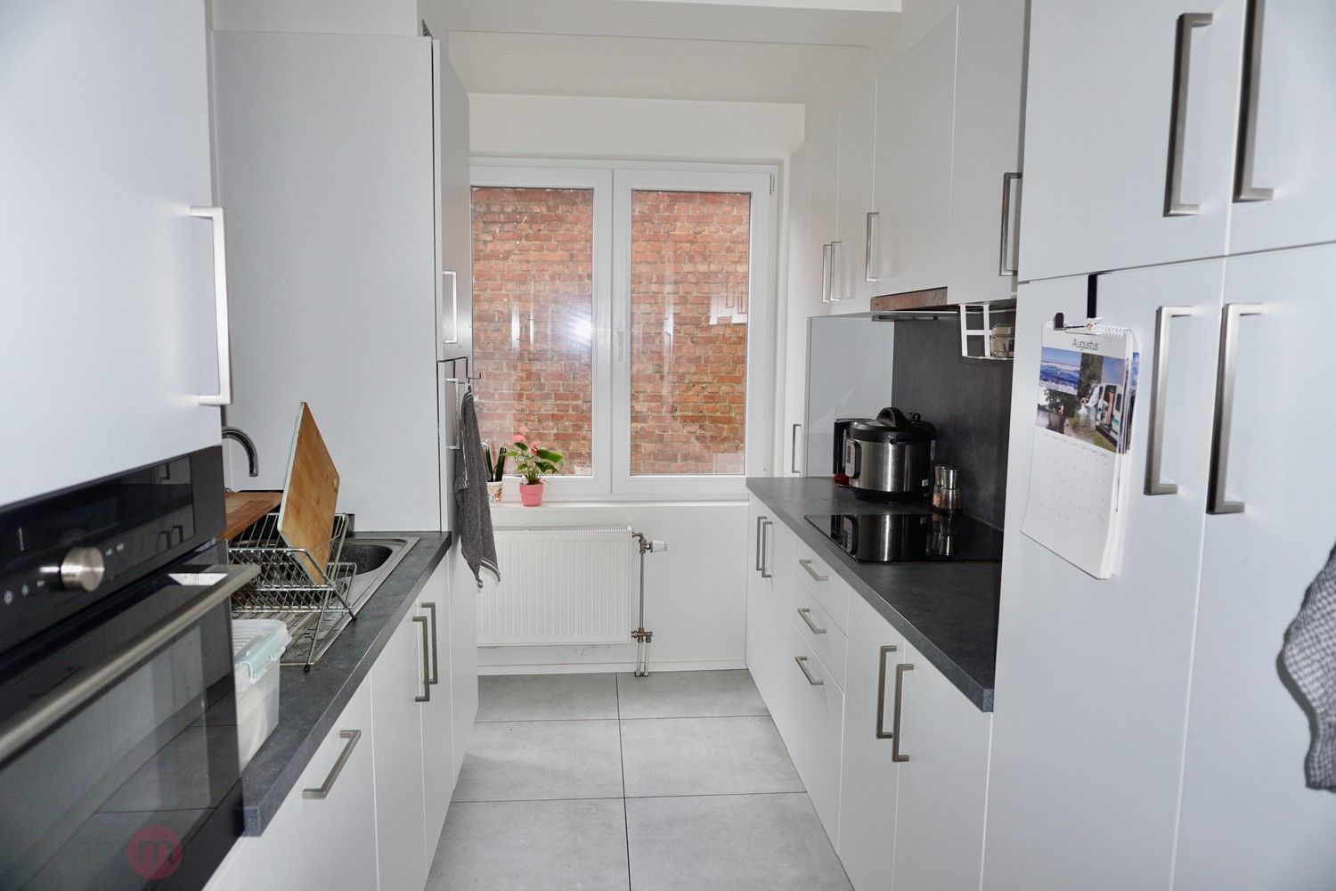 Gerenoveerd 1 slaapkamer appartement met groot terras/binnenkoer en garage. foto 10