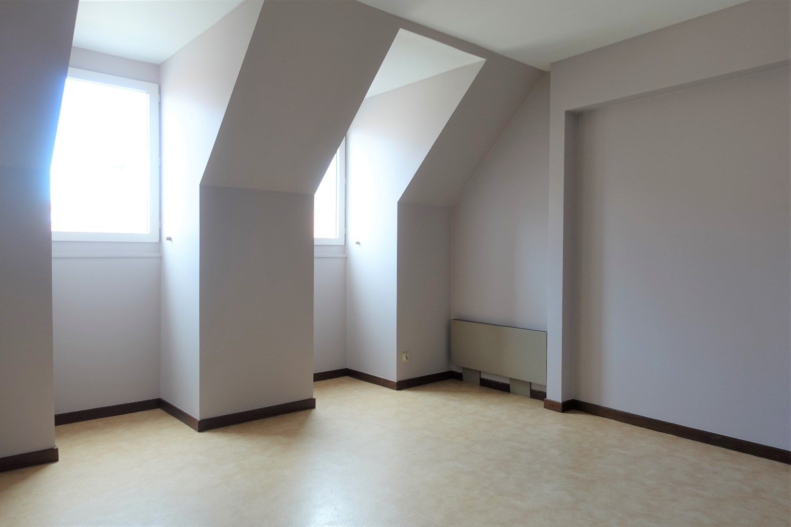 Opbrengsteigendom met 7 appartementen, 2 handelspanden en 7 garageboxen in Gistel foto 22