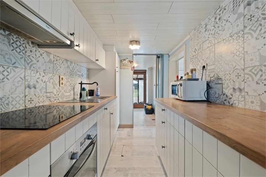 CHARMANTE GEZINSWONING OP EEN RUIM PERCEEL IN BUVINGEN foto 13