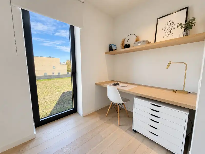Luxueus designappartement met zuidterras, carport en ruime kelder foto 10