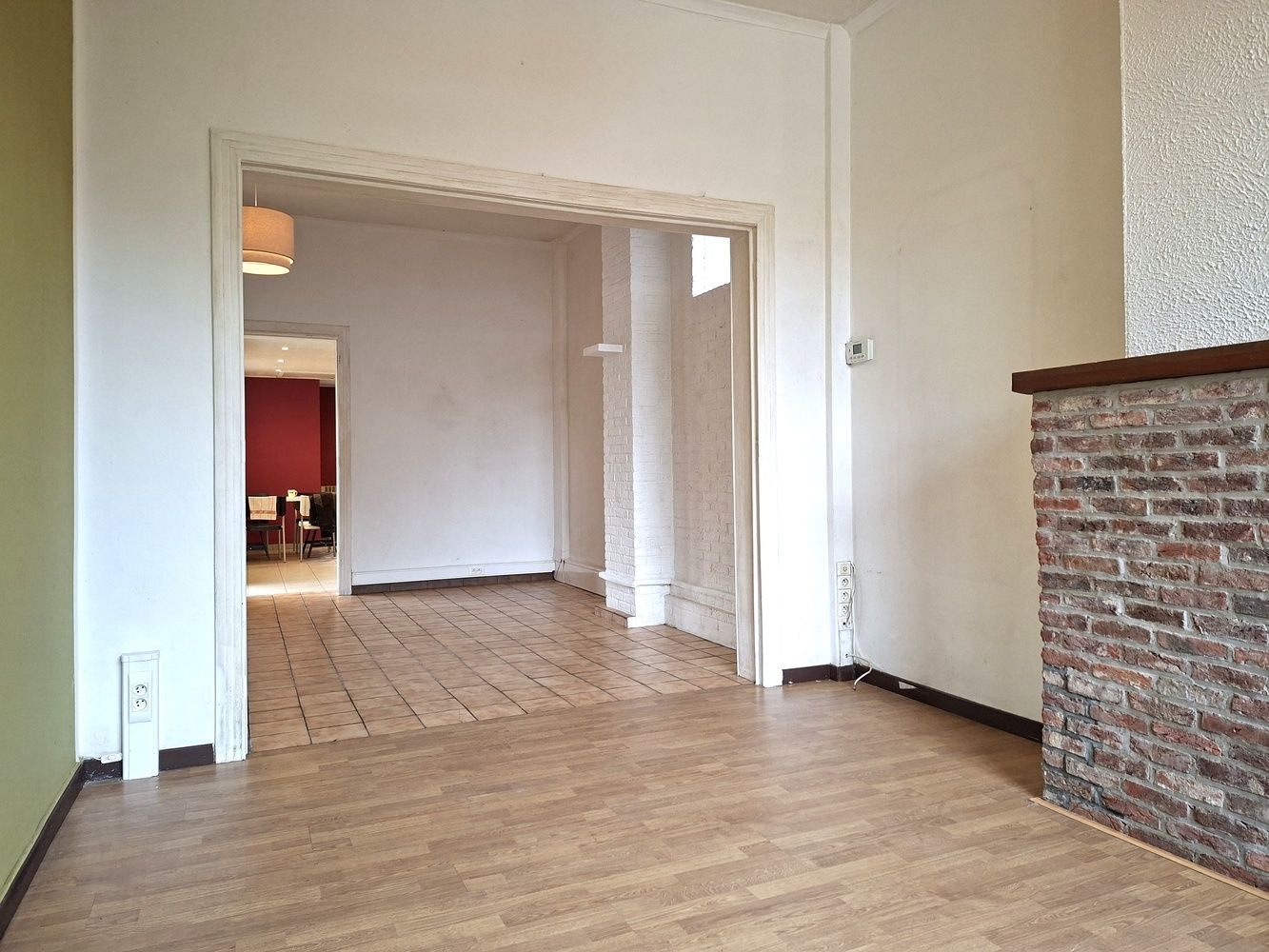 Licht te renoveren woning / 4 slaapkamers en tuin / centrale ligging foto 4