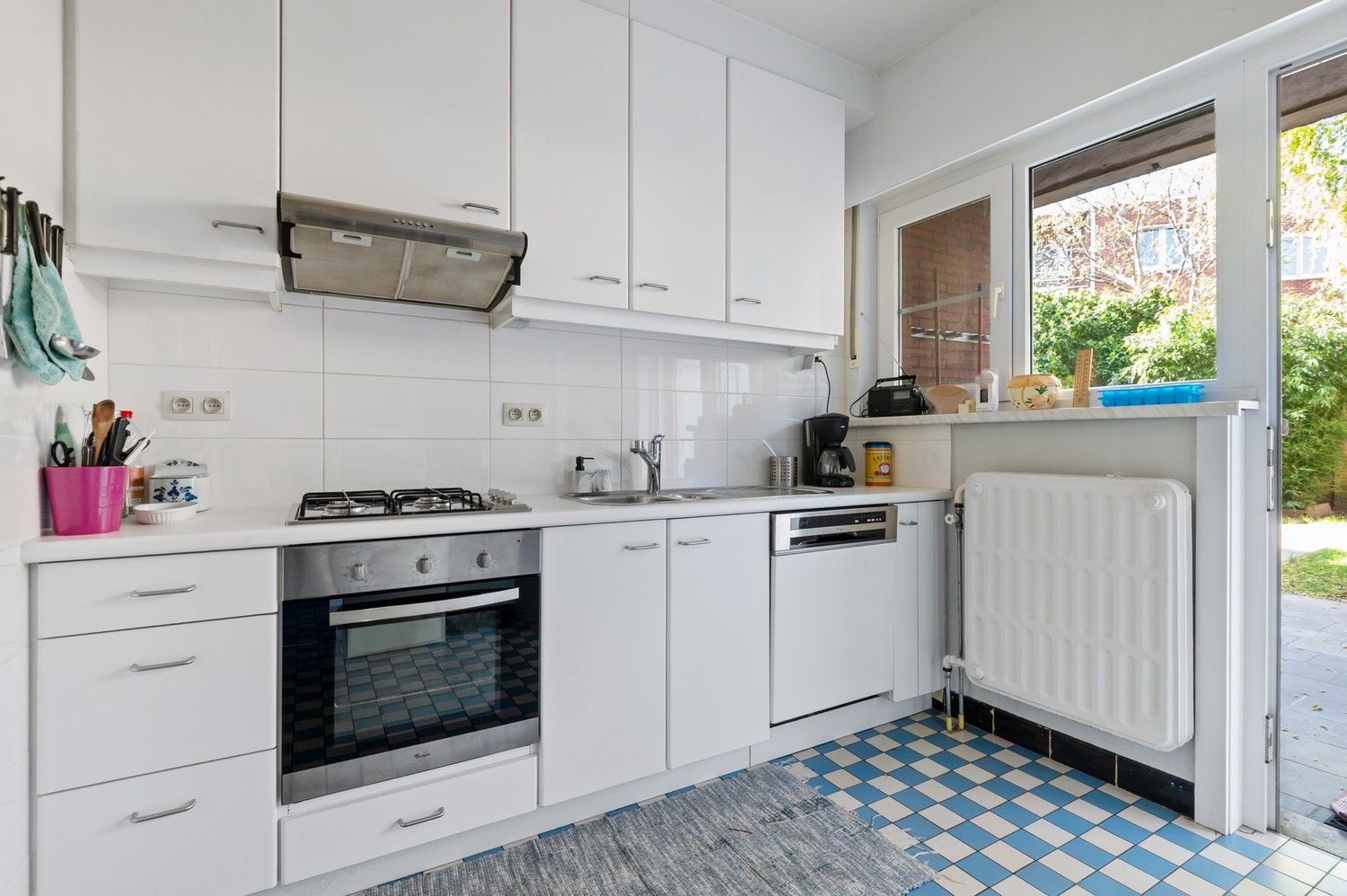 Gelijkvloers appartement met 2 ruime slaapkamers en tuin! foto 8