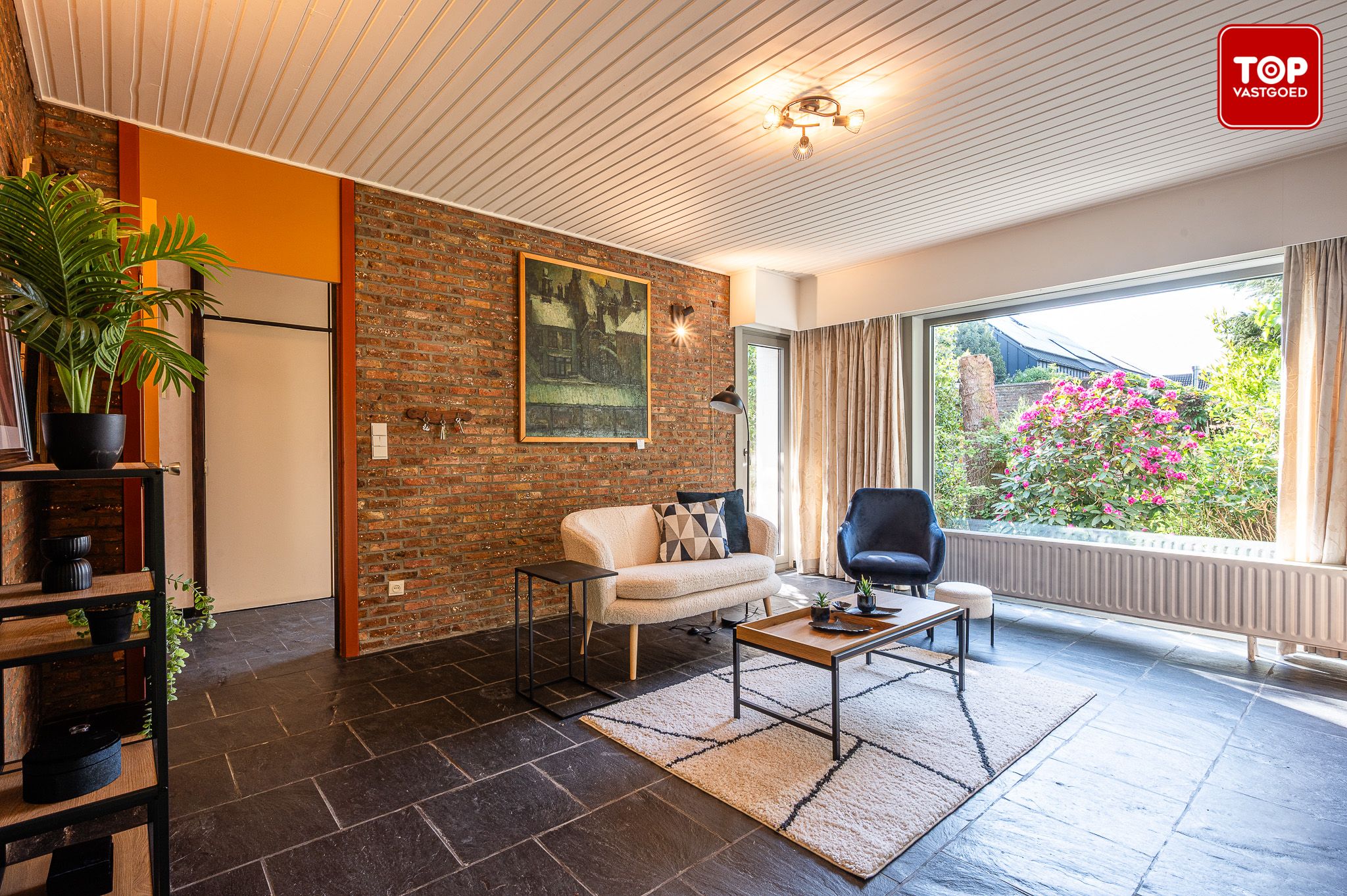 Ruime jaren zeventig villa in Mariakerke-Kolegem foto 7