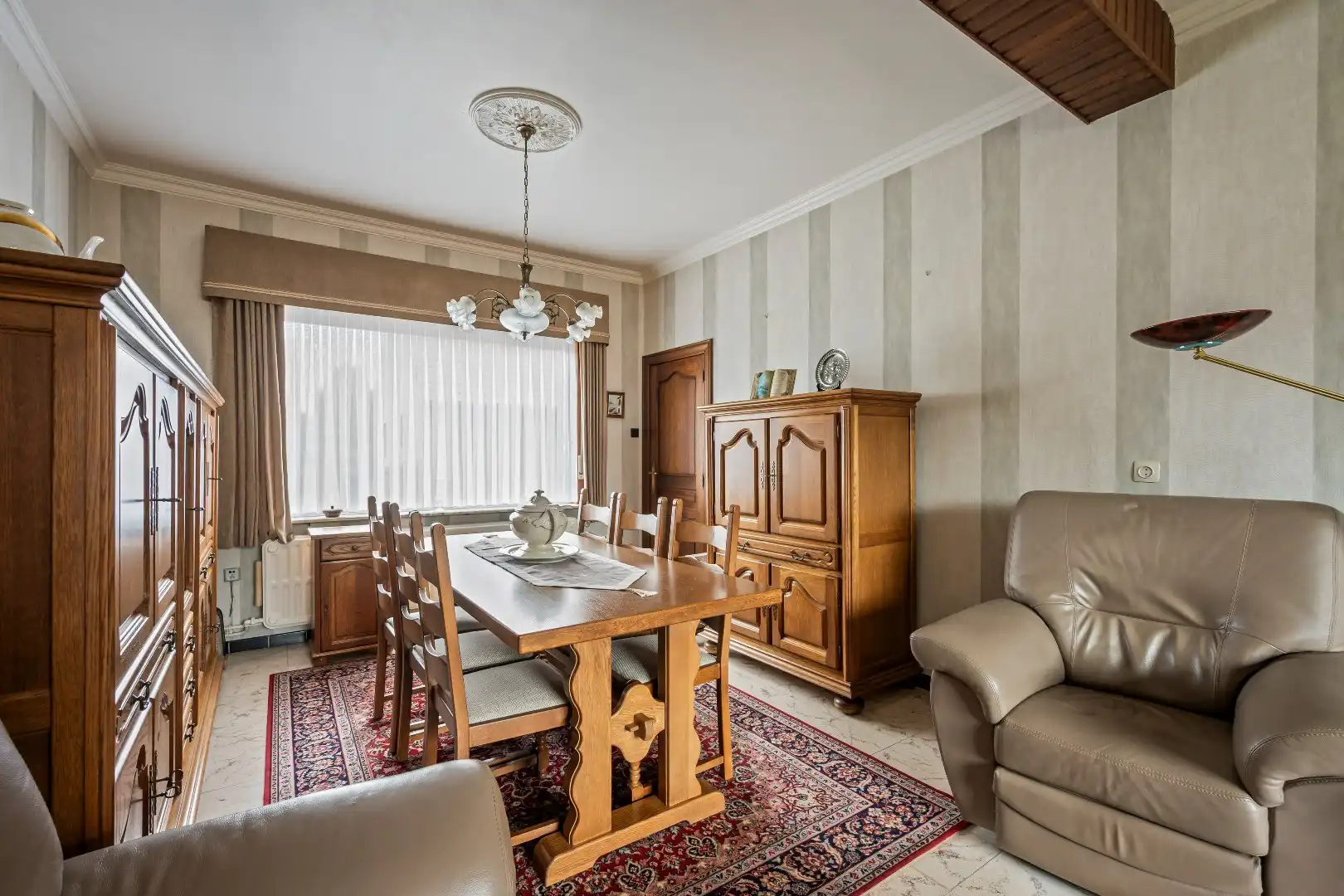 Op te frissen woning met 3 slaapkamers, garage en tuin. foto 12