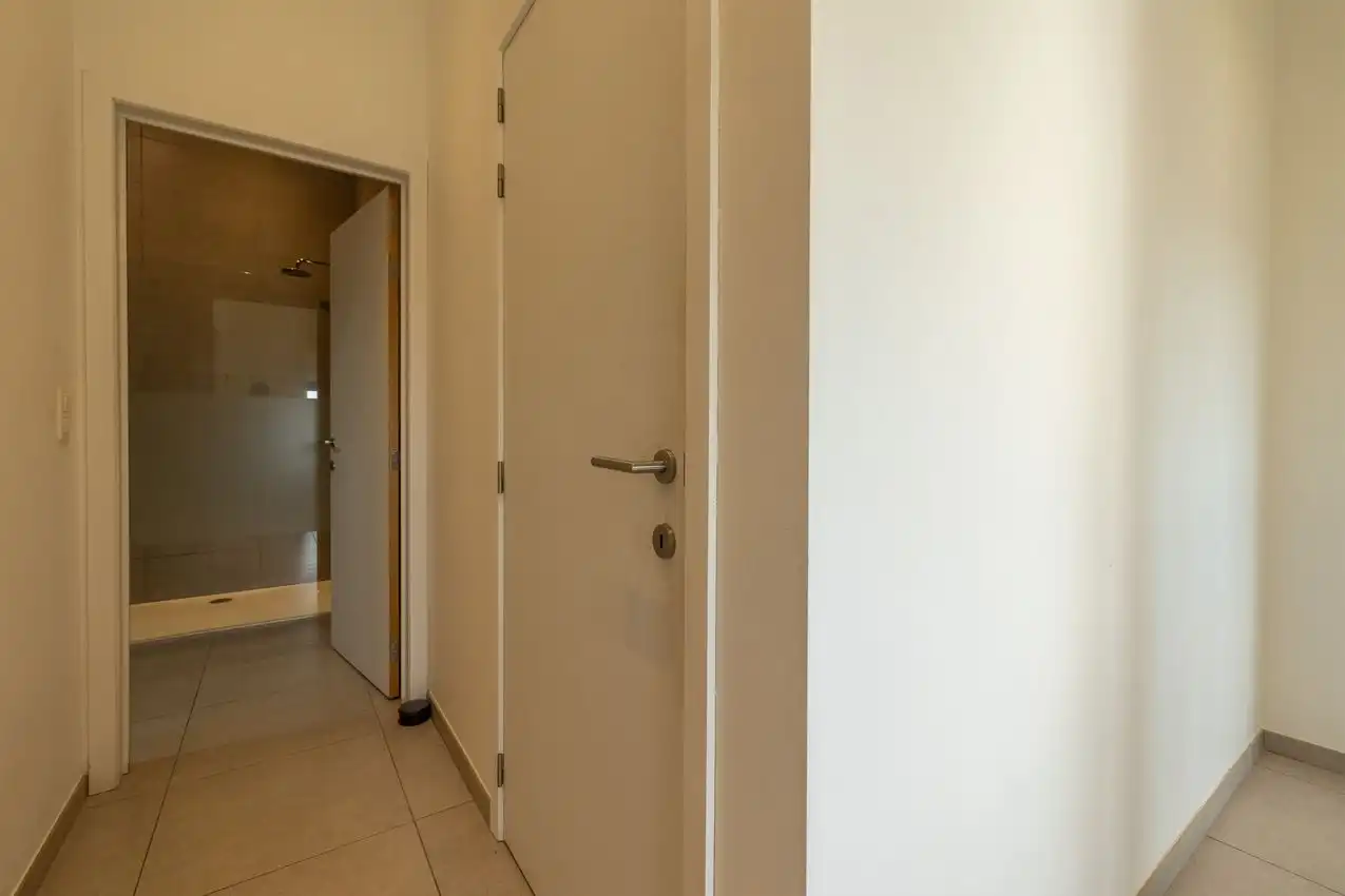 Ruime, zonnige penthouse met 2 slpk. en 2 ondergrondse autostaanplaatsen foto 20