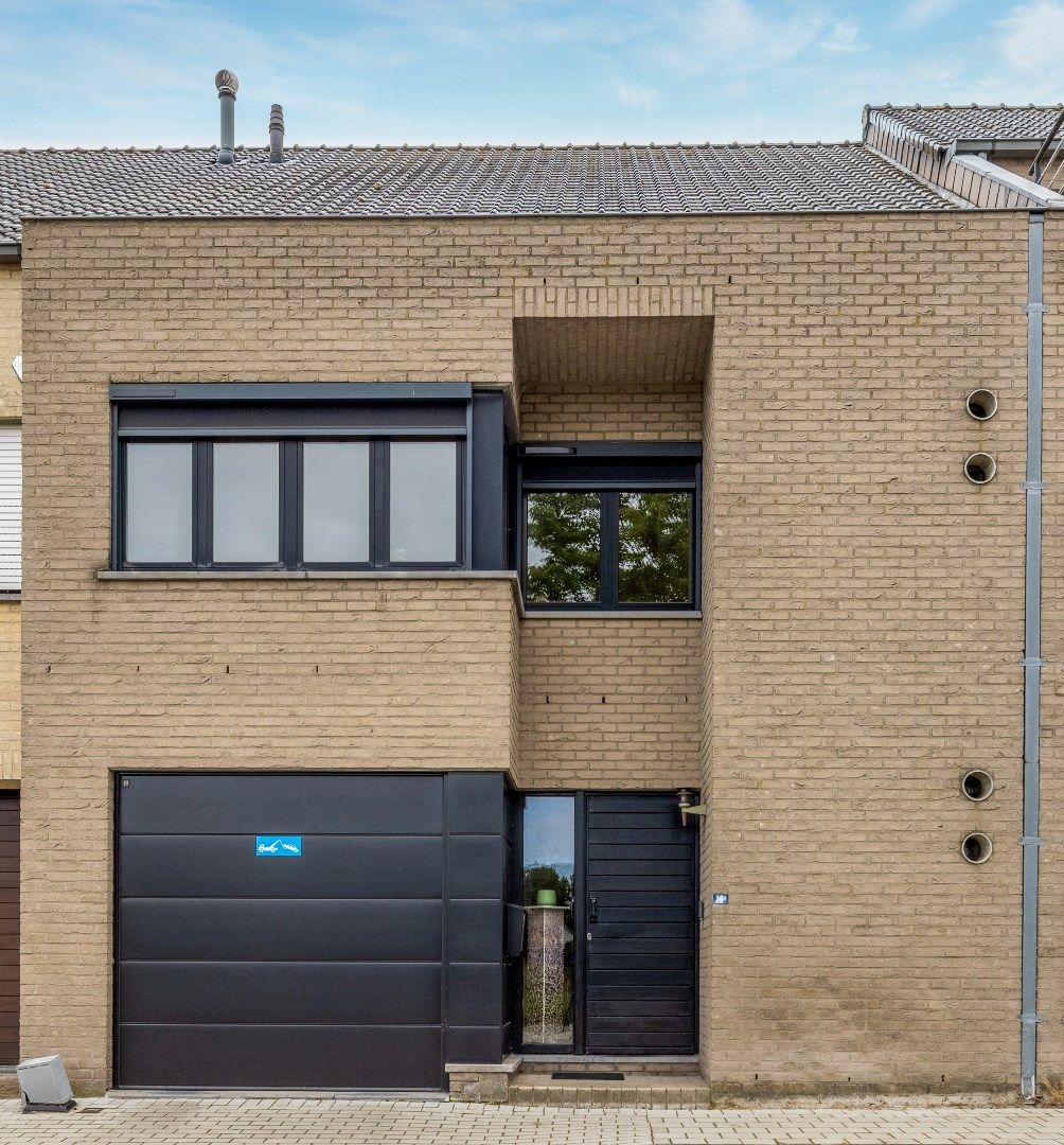 Instapklare en ruime gezinswoning met 3 slk, garage en tuintje foto 22