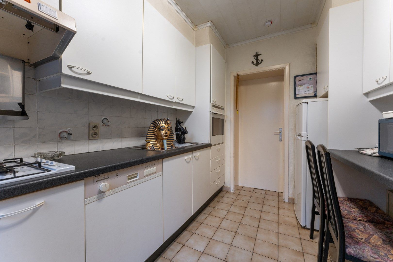 OPBRENGSTEIGENDOM : handelspand met duplex appartement. foto 12