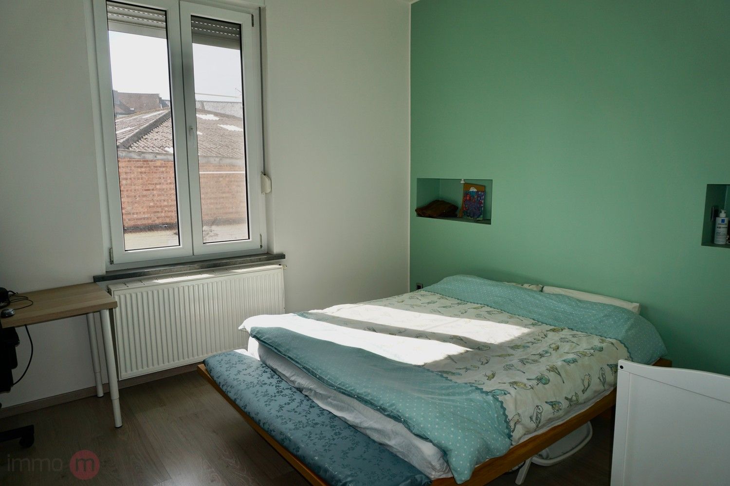 Gezellige rijwoning met 3 slaapkamers en tuin binnen de ring van Leuven. foto 14