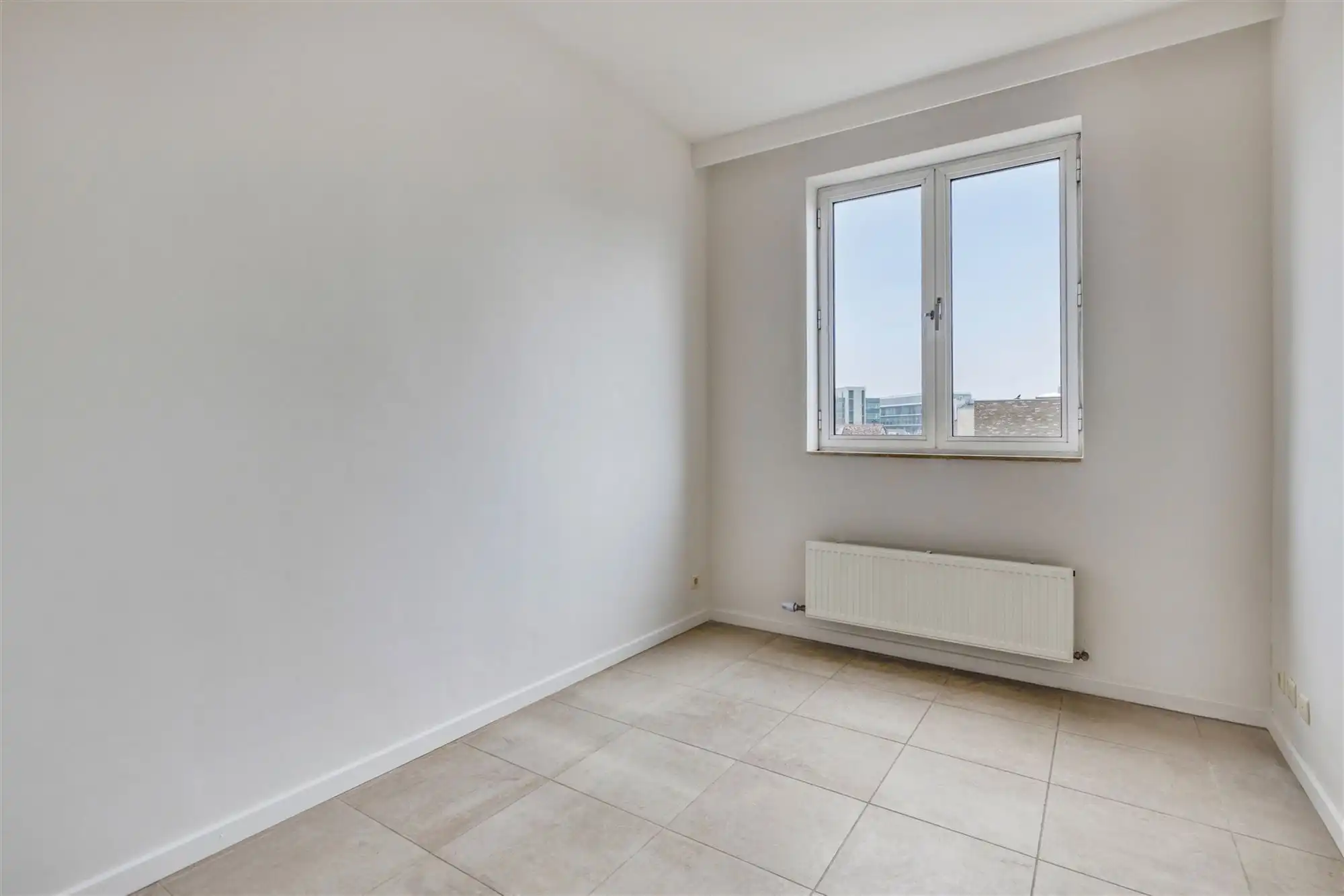 Lichtrijk appartement met terras vlakbij Harmoniepark foto 10