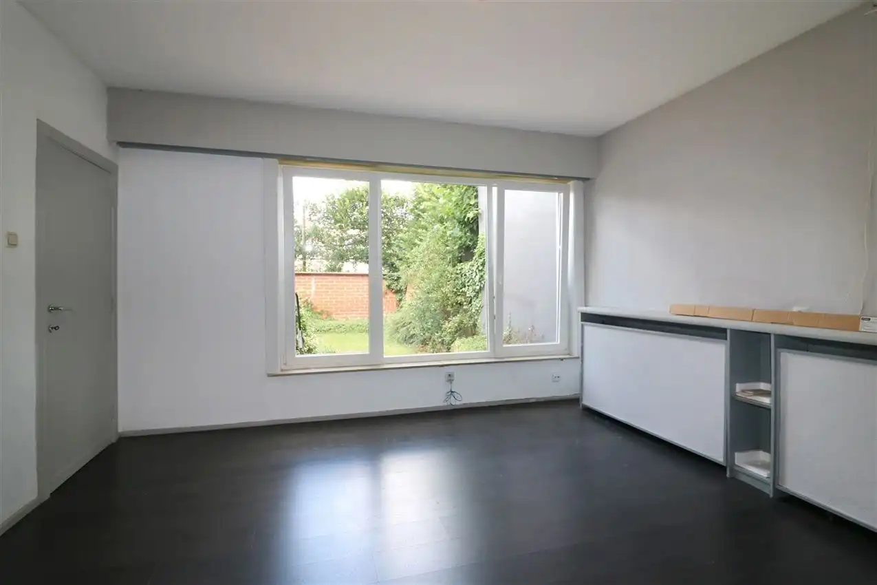 Gelijkvloers app. met tuin te midden van centrum foto 12